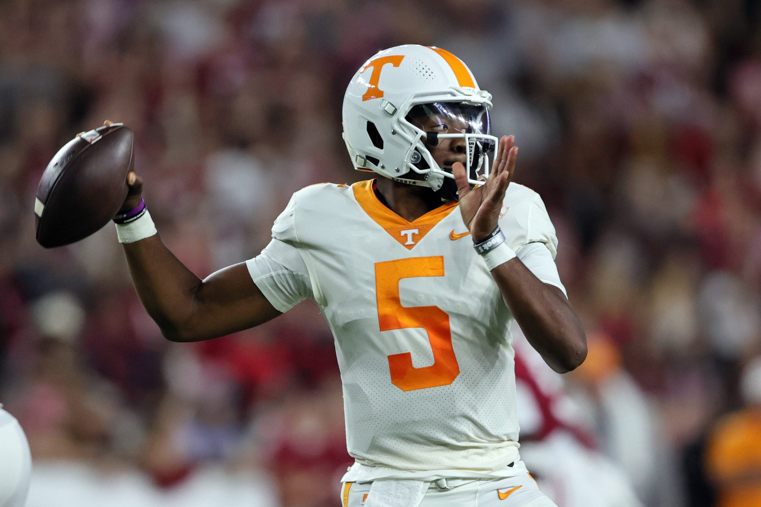 Oct 23, 2021; Tuscaloosa, Alabama, USA; Tennessee Volunteers quarterback Hendon Hooker (5) throws a pass against the Alabama Crimson Tide during the first half at Bryant-Denny Stadium. Mandatory Credit: Butch Dill-USA TODAY Sports