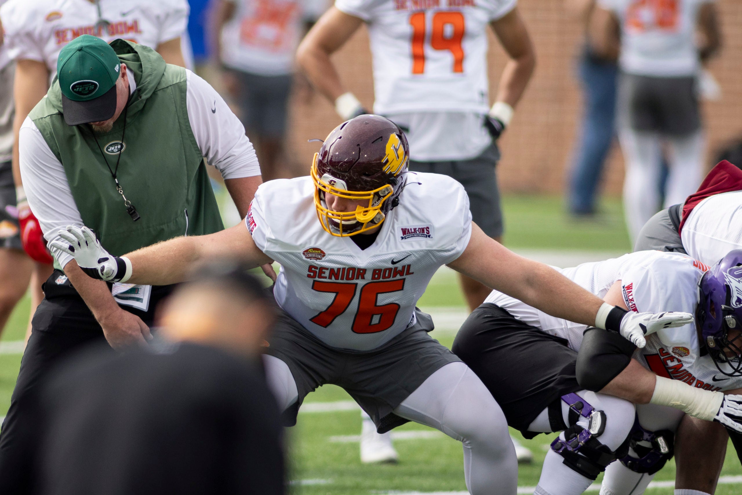 Feb 1, 2022; Mobile, AL, USA; National offensive lineman Bernhard Raimann of Central Michigan (76) works with a coach during National practice for the 2022 Senior Bowl at Hancock Whitney Stadium. Mandatory Credit: Vasha Hunt-USA TODAY Sports