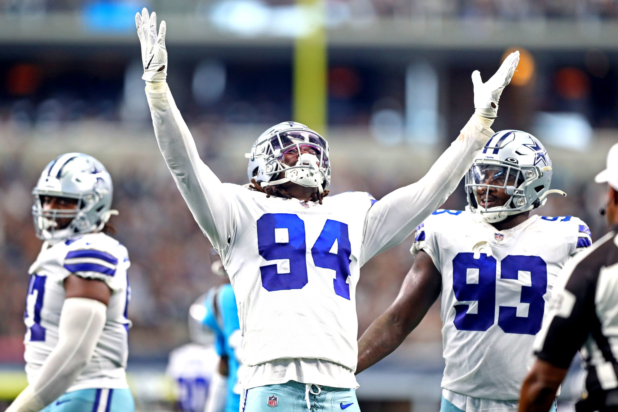 Oct 3, 2021; Arlington, Texas, USA; Dallas Cowboys defensive tackle Osa Odighizuwa (97) reacts after a play during the second half against the Carolina Panthers at AT&T Stadium. Mandatory Credit: Mark J. Rebilas-USA TODAY Sports