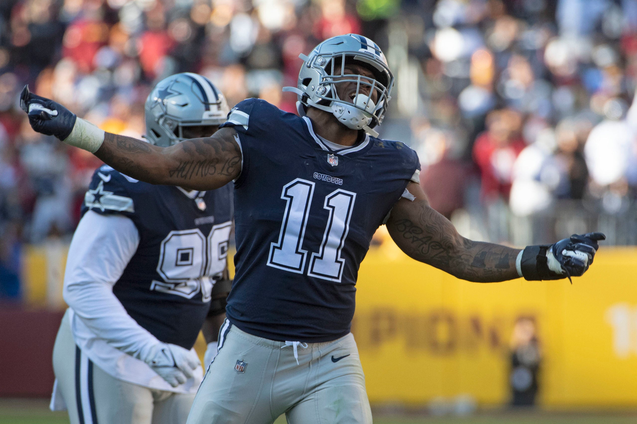 Dec 12, 2021; Landover, Maryland, USA; Dallas Cowboys linebacker Micah Parsons (11) reacts after a sack against the Washington Football Team during the first half at FedExField. Mandatory Credit: Brad Mills-USA TODAY Sports