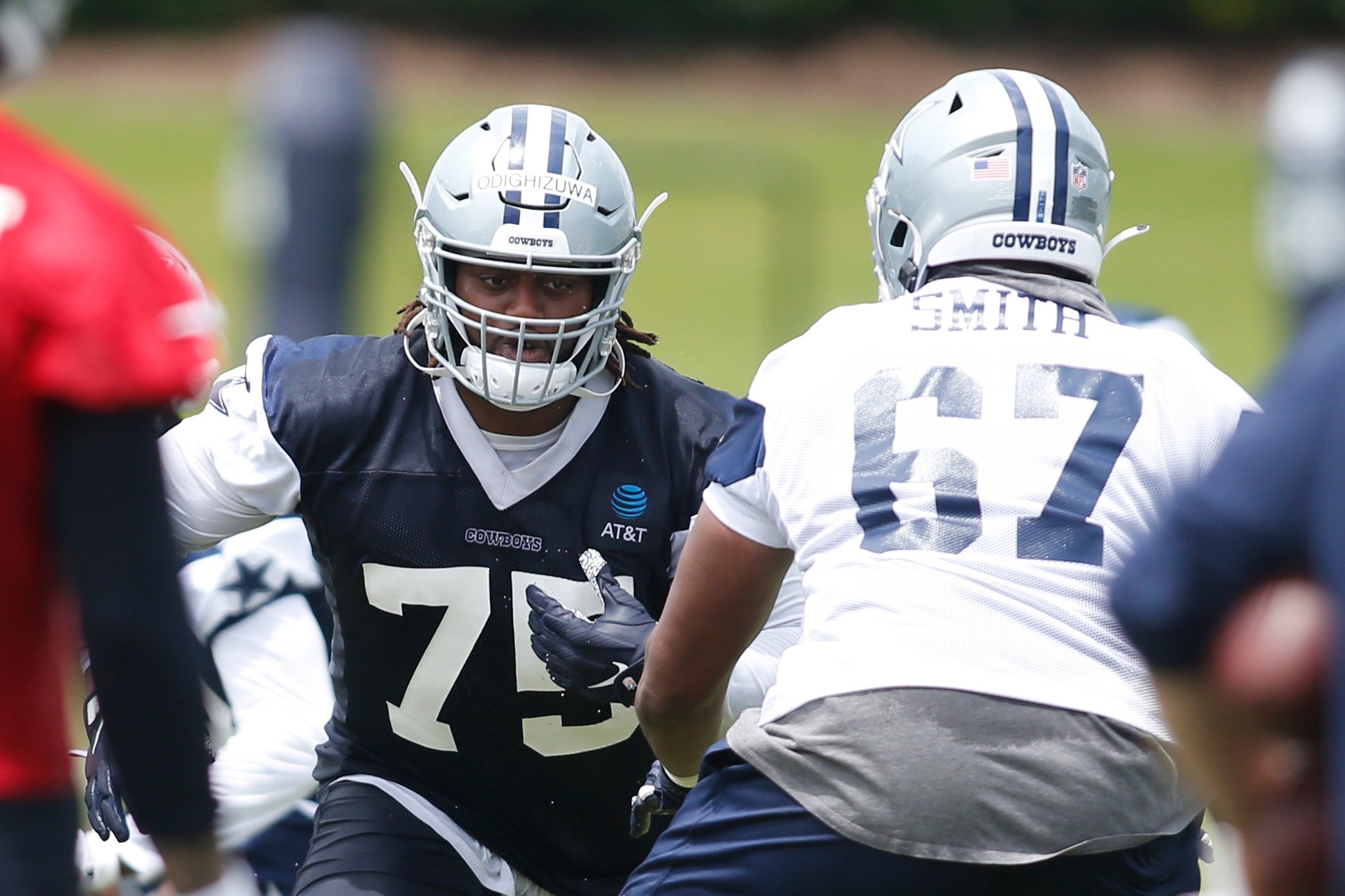 Jun 3, 2021; Frisco, TX, USA; Dallas Cowboys defensive tackle Osa Odighizuwa (75) goes through drills during voluntary Organized Team Activities at the Star Training Facility in Frisco, Texas. Mandatory Credit: Tim Heitman-USA TODAY Sports