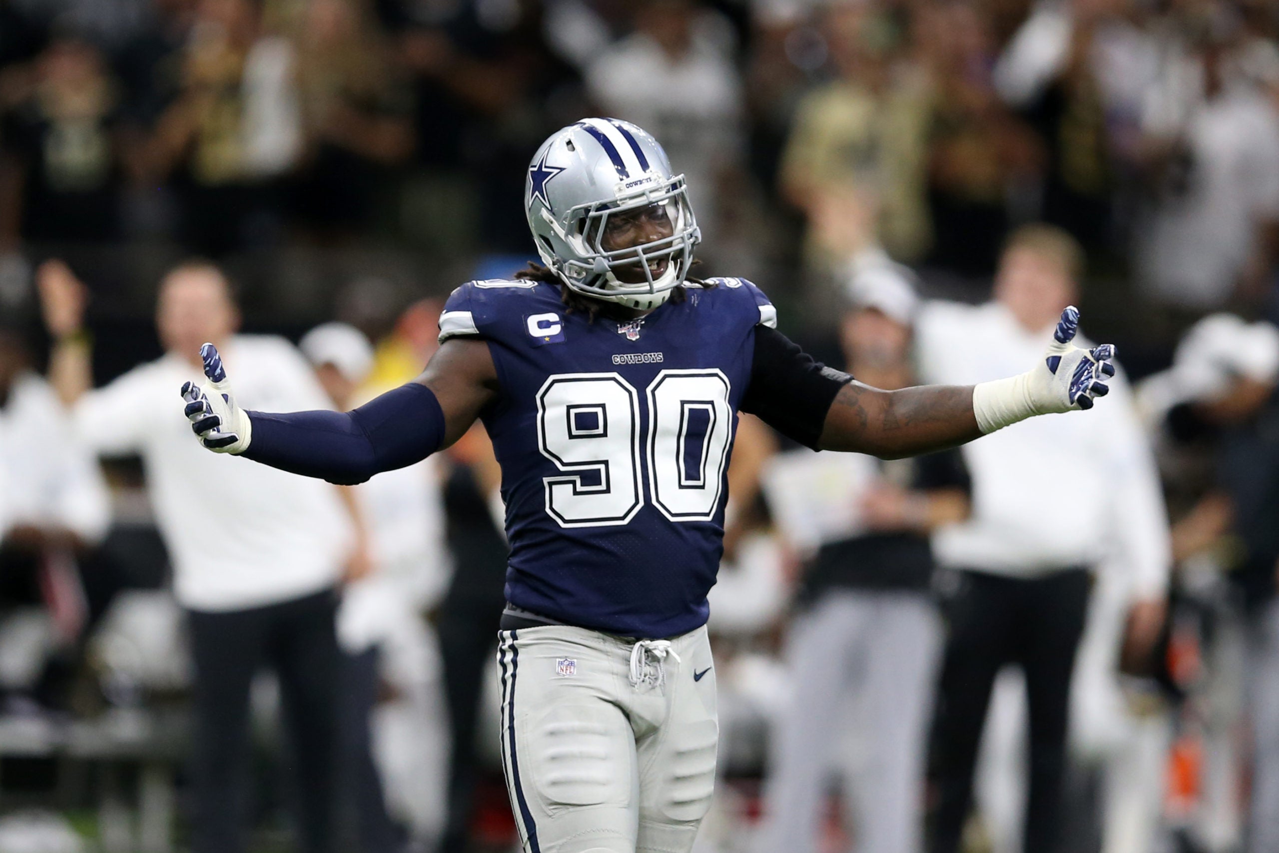 Sep 29, 2019; New Orleans, LA, USA; Dallas Cowboys defensive end Demarcus Lawrence (90) gestures after being called for a penalty in the second quarter against the New Orleans Saints at the Mercedes-Benz Superdome. Mandatory Credit: Chuck Cook-USA TODAY Sports