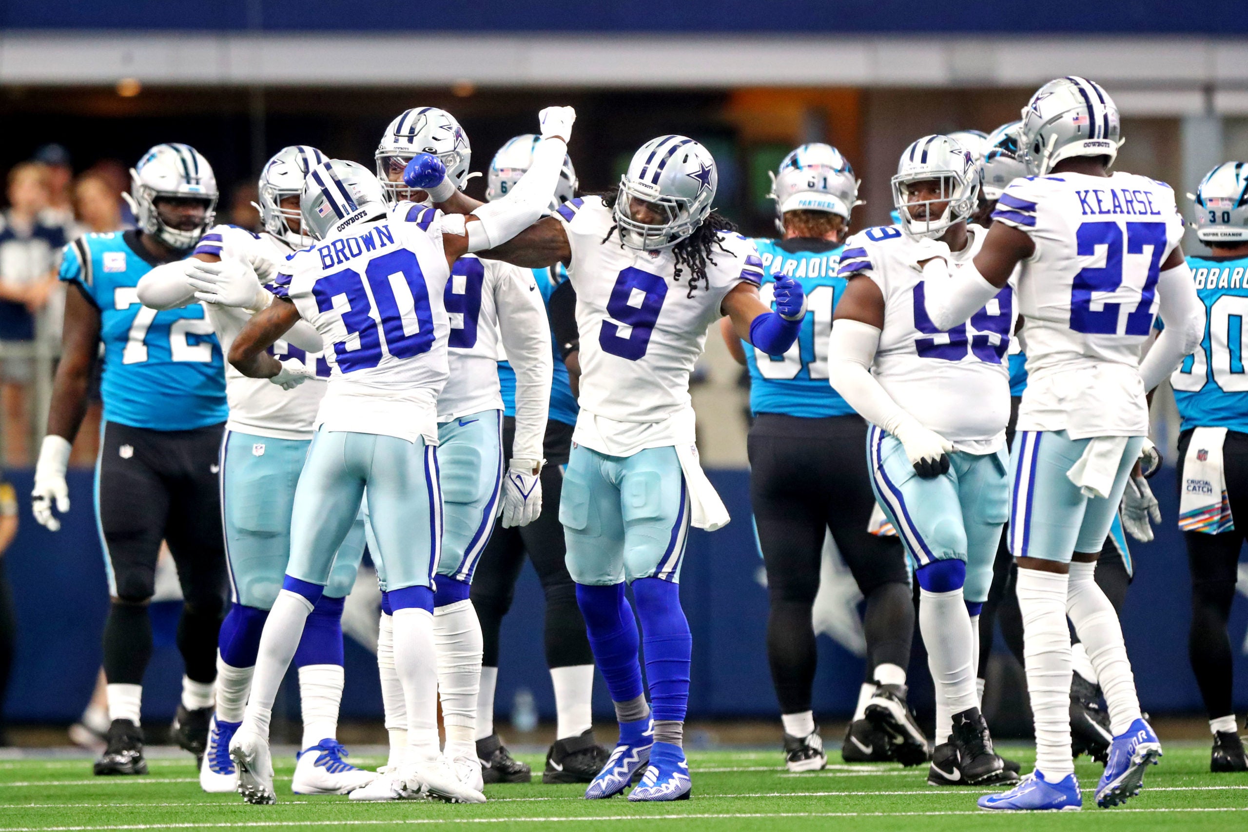Oct 3, 2021; Arlington, Texas, USA; Dallas Cowboys middle linebacker Jaylon Smith (9) and cornerback Anthony Brown (30) celebrates during the second quarter against the Carolina Panthers at AT&T Stadium. Mandatory Credit: Mark J. Rebilas-USA TODAY Sports
