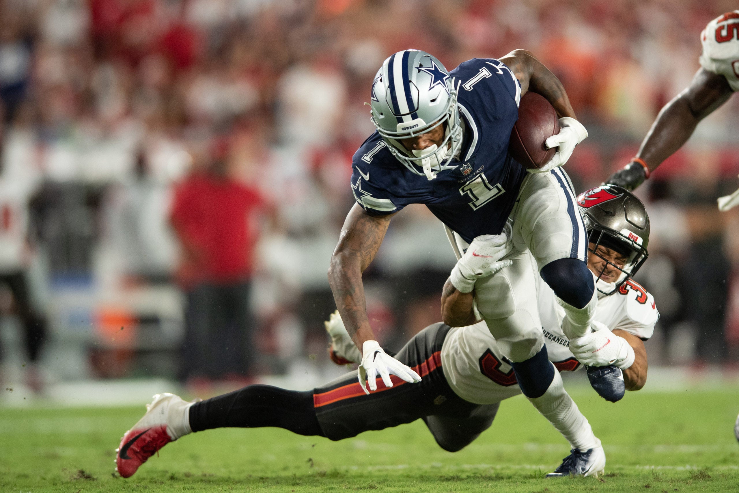 Sep 9, 2021; Tampa, Florida, USA; Dallas Cowboys wide receiver Cedrick Wilson (1) makes a catch against the Tampa Bay Buccaneers in the second quarter at Raymond James Stadium. Mandatory Credit: Jeremy Reper-USA TODAY Sports