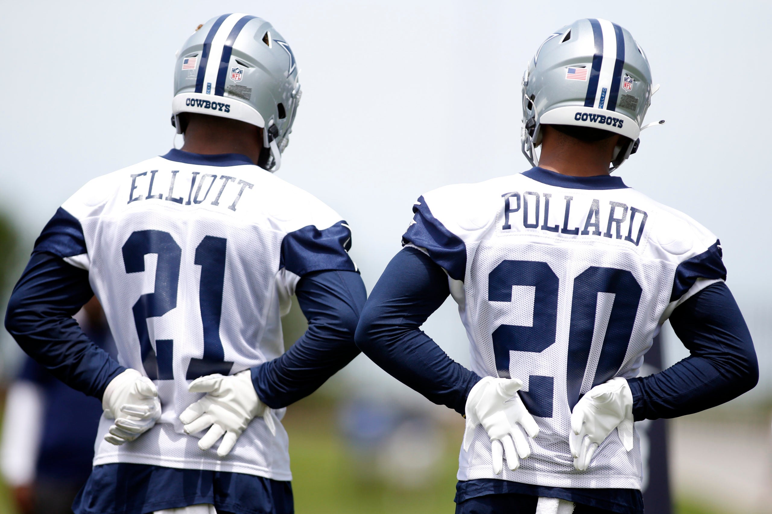 Jun 8, 2021; Frisco, TX, USA; Dallas Cowboys running back Ezekiel Elliott (21) and running back Tony Pollard (20) on the field during voluntary Organized Team Activities at the Ford Center at the Star Training Facility in Frisco, Texas. Mandatory Credit: Tim Heitman-USA TODAY Sports