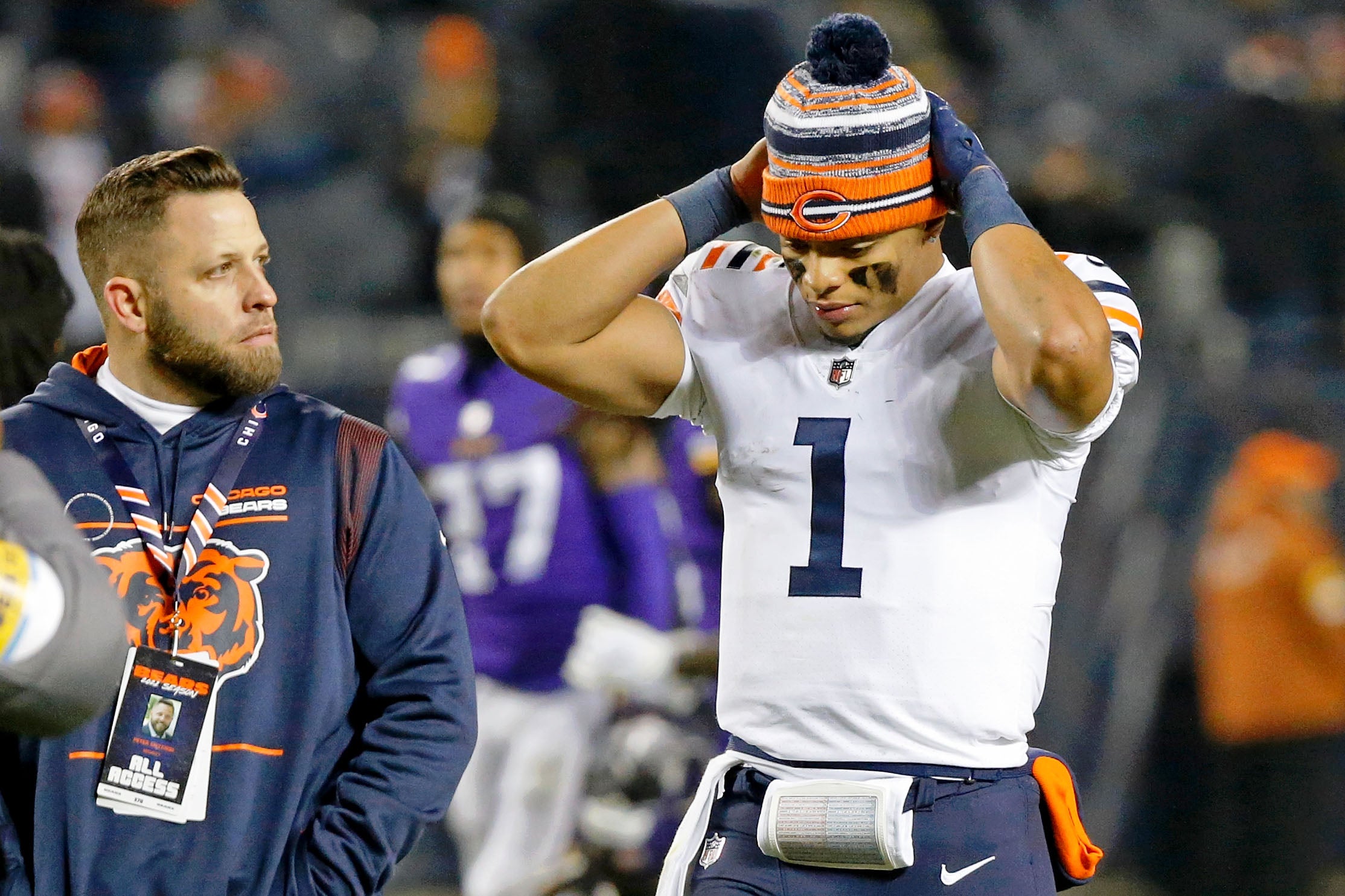 Dec 20, 2021; Chicago, Illinois, USA; Chicago Bears quarterback Justin Fields (1) reacts as he walks off the field after their loss to the Minnesota Vikings at Soldier Field. The Minnesota Vikings won 17-9. Mandatory Credit: Jon Durr-USA TODAY Sports