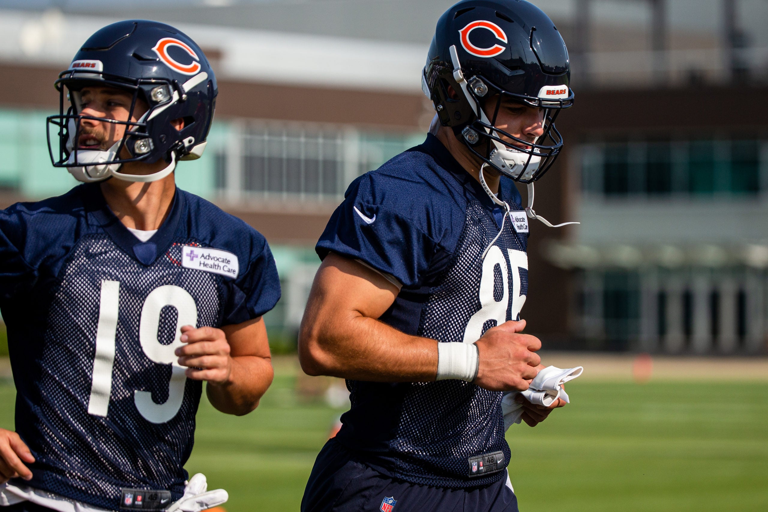 Jul 29, 2021; Lake Forest, IL, USA; Chicago Bears tight end Cole Kmet (85) runs a lap around the field at the start of a Chicago Bears training camp session at Halas Hall. Mandatory Credit: Jon Durr-USA TODAY Sports