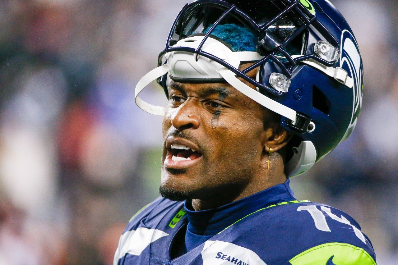 Oct 25, 2021; Seattle, Washington, USA; Seattle Seahawks wide receiver DK Metcalf (14) talks on the sideline during the third quarter against the New Orleans Saints at Lumen Field. Mandatory Credit: Joe Nicholson-USA TODAY Sports