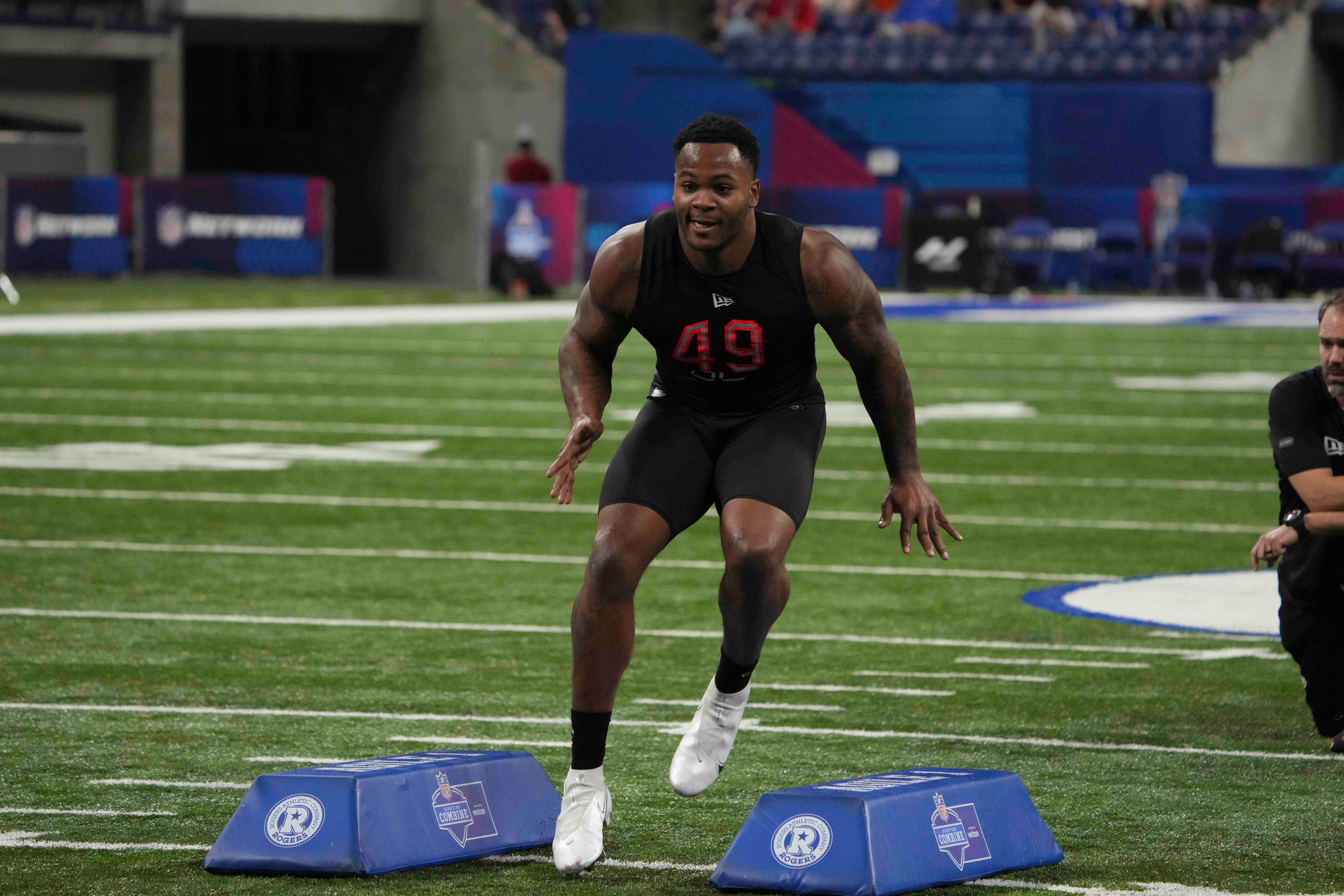 Mar 5, 2022; Indianapolis, IN, USA; Mississippi defensive lineman Sam Williams (DL49) goes through drills during the 2022 NFL Scouting Combine at Lucas Oil Stadium. Mandatory Credit: Kirby Lee-USA TODAY Sports