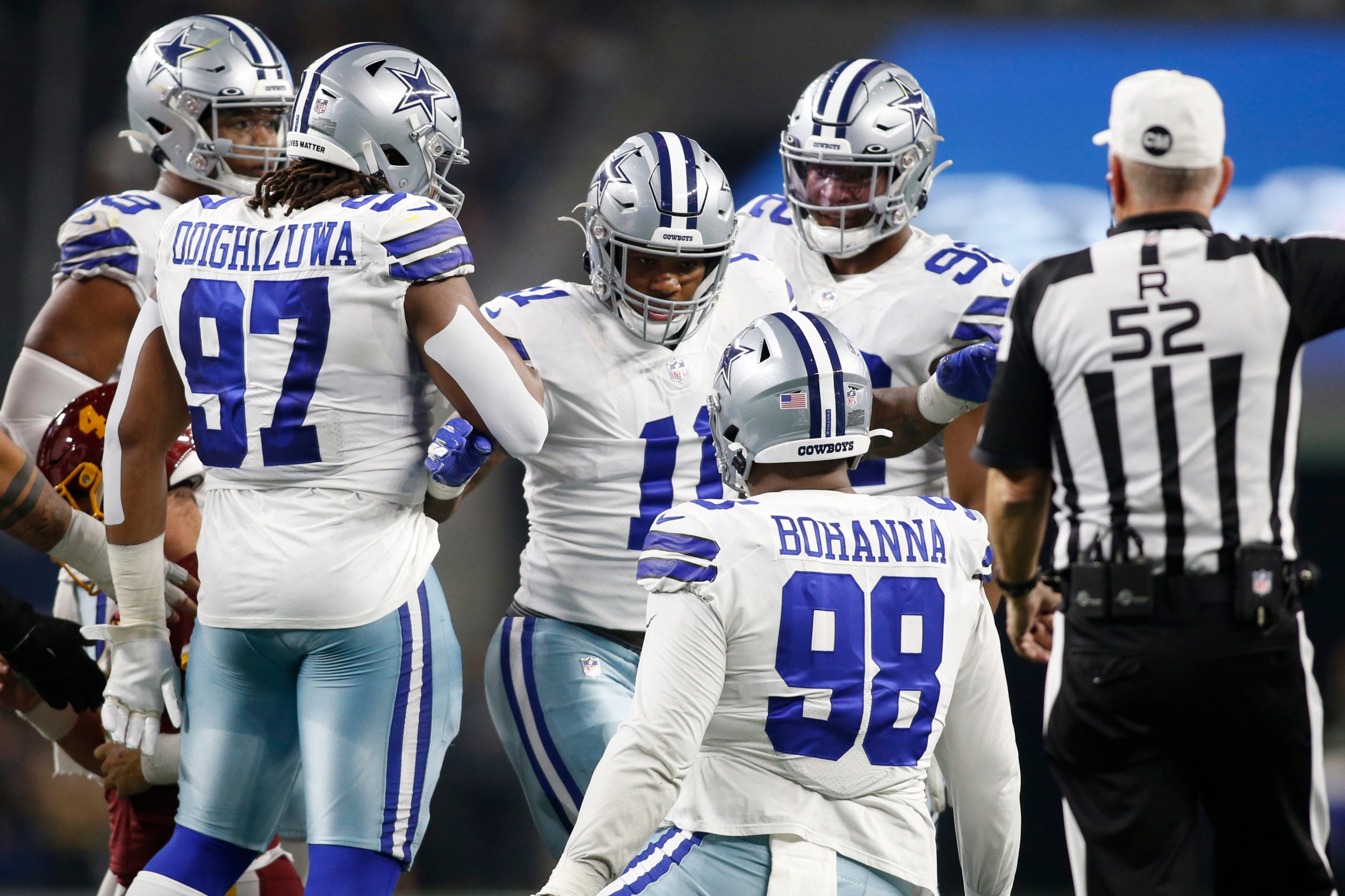Dec 26, 2021; Arlington, Texas, USA; Dallas Cowboys outside linebacker Micah Parsons (11) celebrates a sack with his teammates in the second quarter against the Washington Football Team at AT&T Stadium. Mandatory Credit: Tim Heitman-USA TODAY Sports