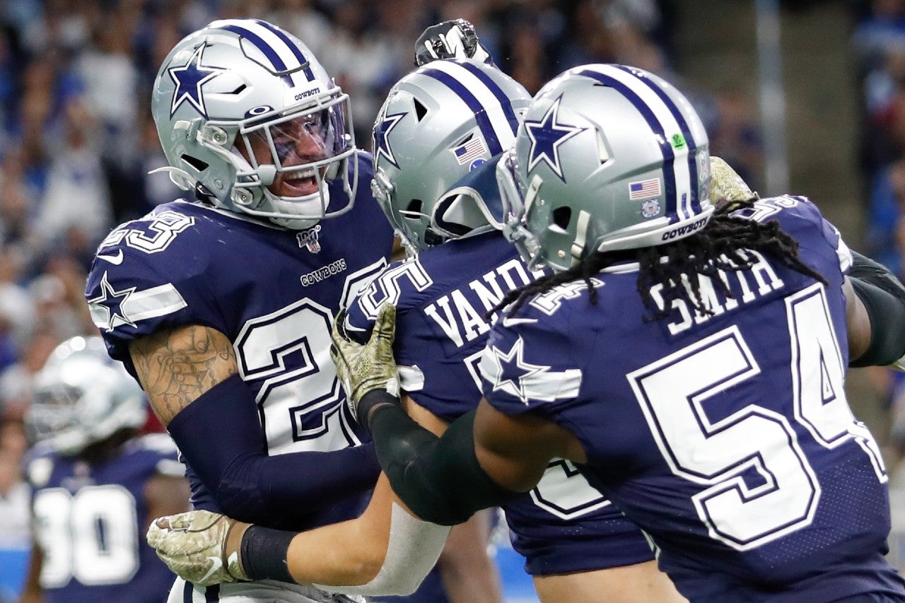 Nov 17, 2019; Detroit, MI, USA; Dallas Cowboys defensive back Darian Thompson (23) celebrates with outside linebacker Leighton Vander Esch (55) and middle linebacker Jaylon Smith (54) during the second quarter against the Detroit Lions at Ford Field. Mandatory Credit: Raj Mehta-USA TODAY Sports