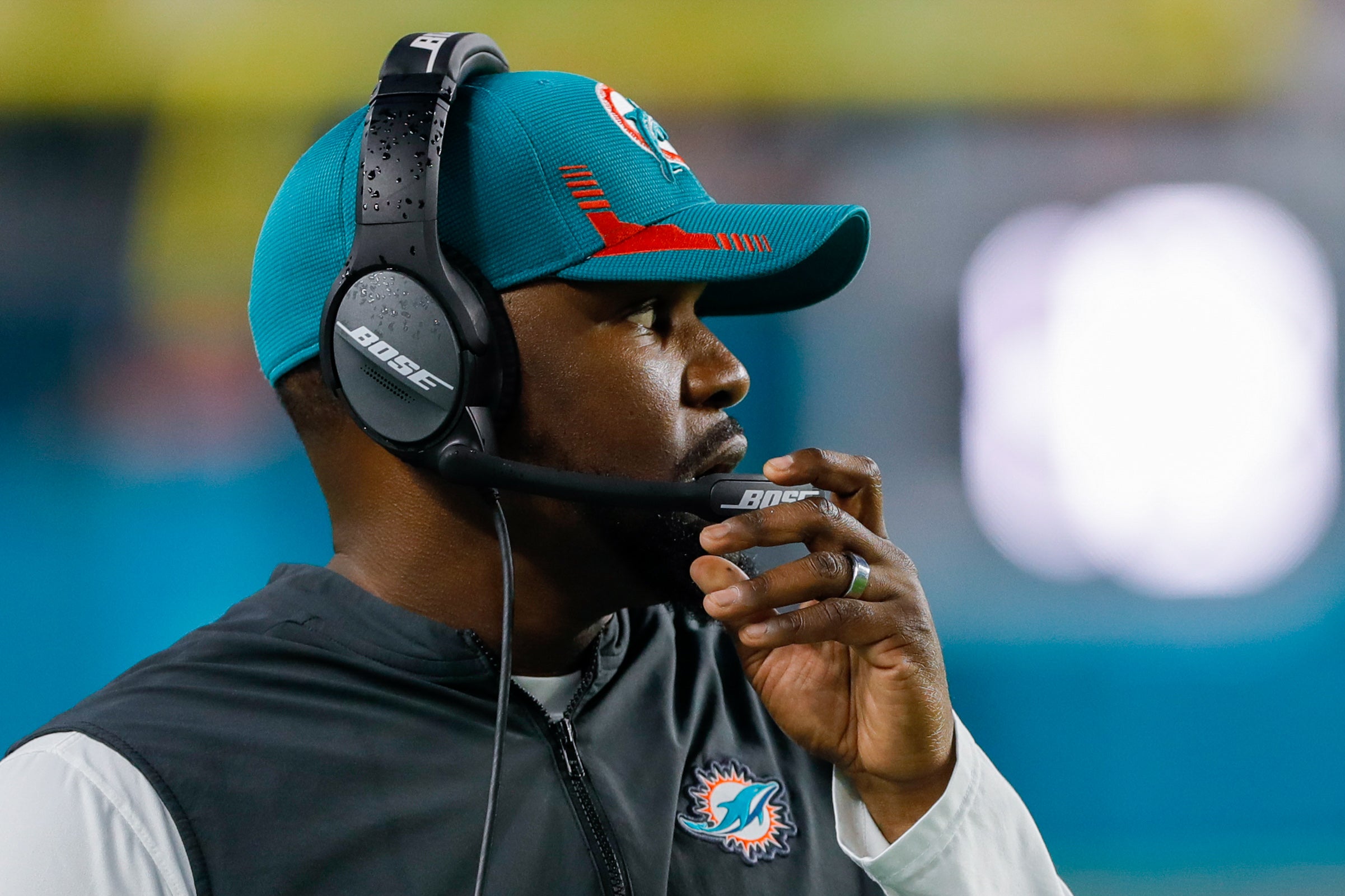 Jan 9, 2022; Miami Gardens, Florida, USA; Miami Dolphins head coach Brian Flores watches from the sideline during the second quarter of the game against the New England Patriots at Hard Rock Stadium. Mandatory Credit: Sam Navarro-USA TODAY Sports