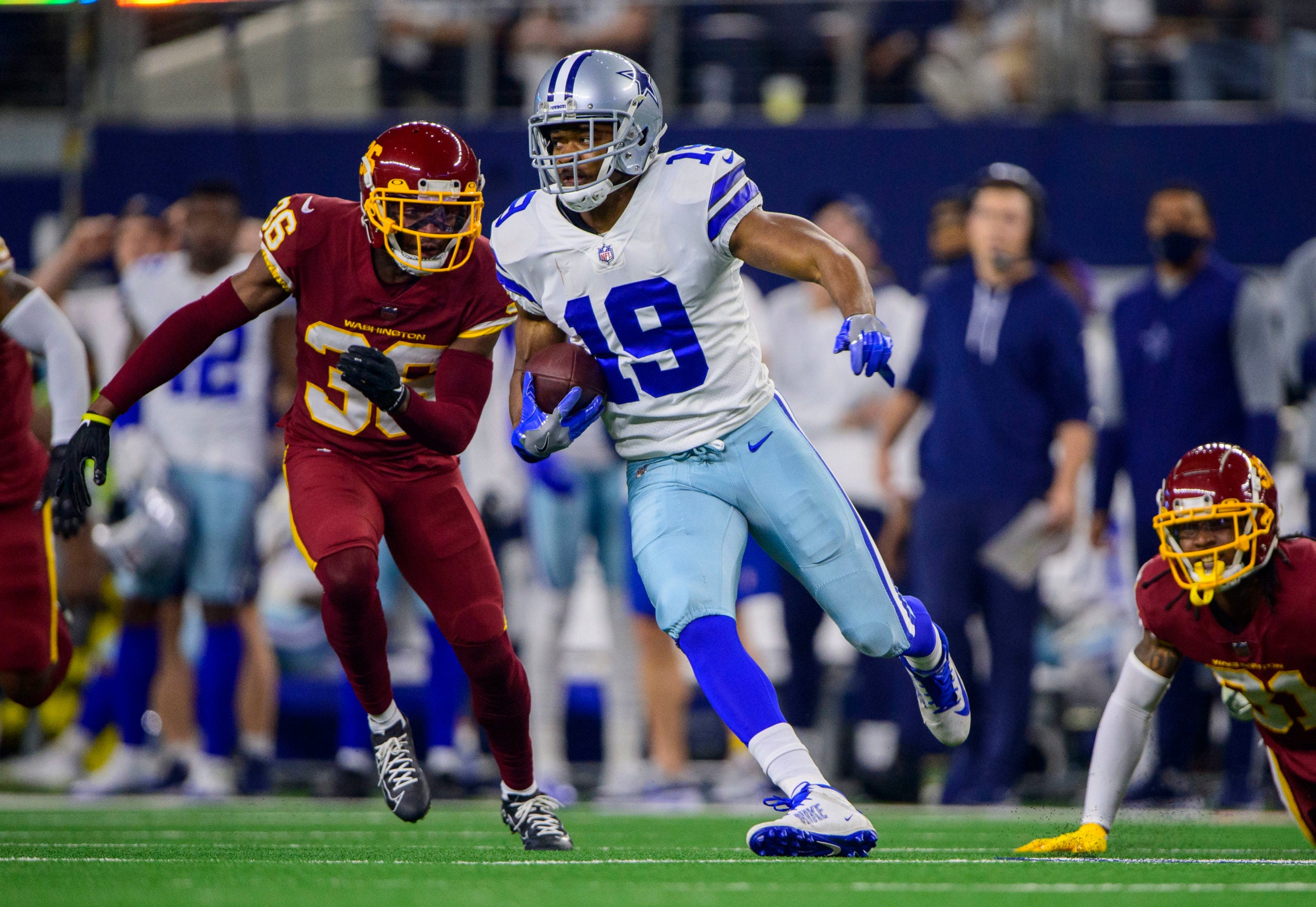 Dec 26, 2021; Arlington, Texas, USA; Washington Football Team cornerback Danny Johnson (36) and Dallas Cowboys wide receiver Amari Cooper (19) in action during the game between the Washington Football Team and the Dallas Cowboys at AT&T Stadium. Mandatory Credit: Jerome Miron-USA TODAY Sports