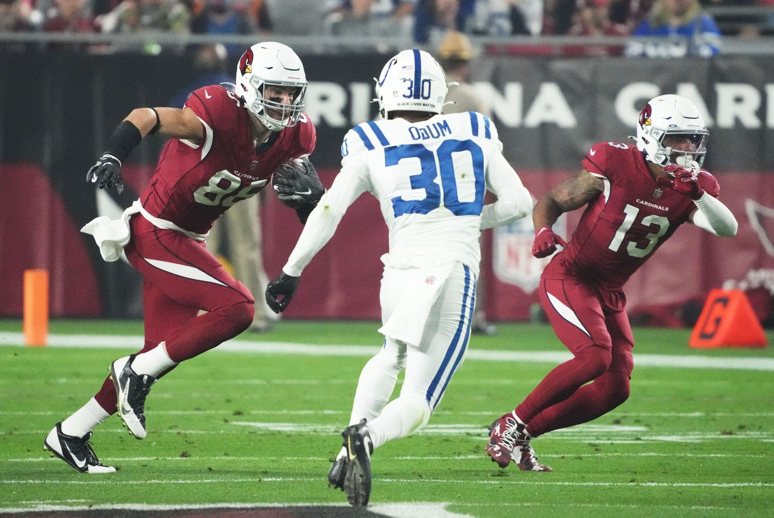 Dec 25, 2021; Glendale, Arizona, USA; Arizona Cardinals tight end Zach Ertz (86) runs with the ball against Indianapolis Colts safety George Odum (30) in the first half at State Farm Stadium. Mandatory Credit: Rob Schumacher-Arizona Republic Nfl Indianapolis Colts At Arizona Cardinals