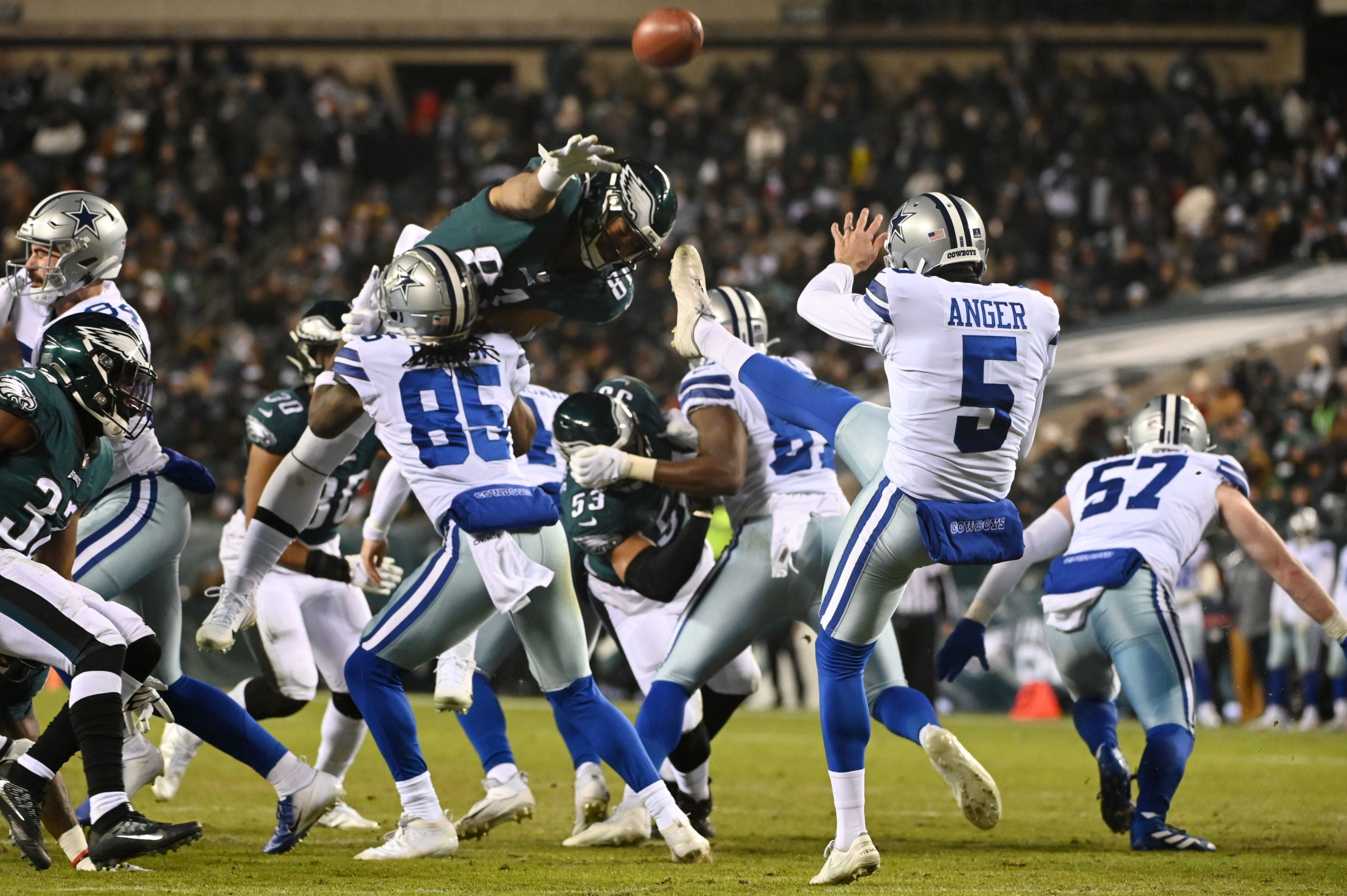 Jan 8, 2022; Philadelphia, Pennsylvania, USA; Philadelphia Eagles tight end Jason Croom (81) attempts to block the punt of Dallas Cowboys punter Bryan Anger (5) during the third quarter at Lincoln Financial Field. Mandatory Credit: Tommy Gilligan-USA TODAY Sports