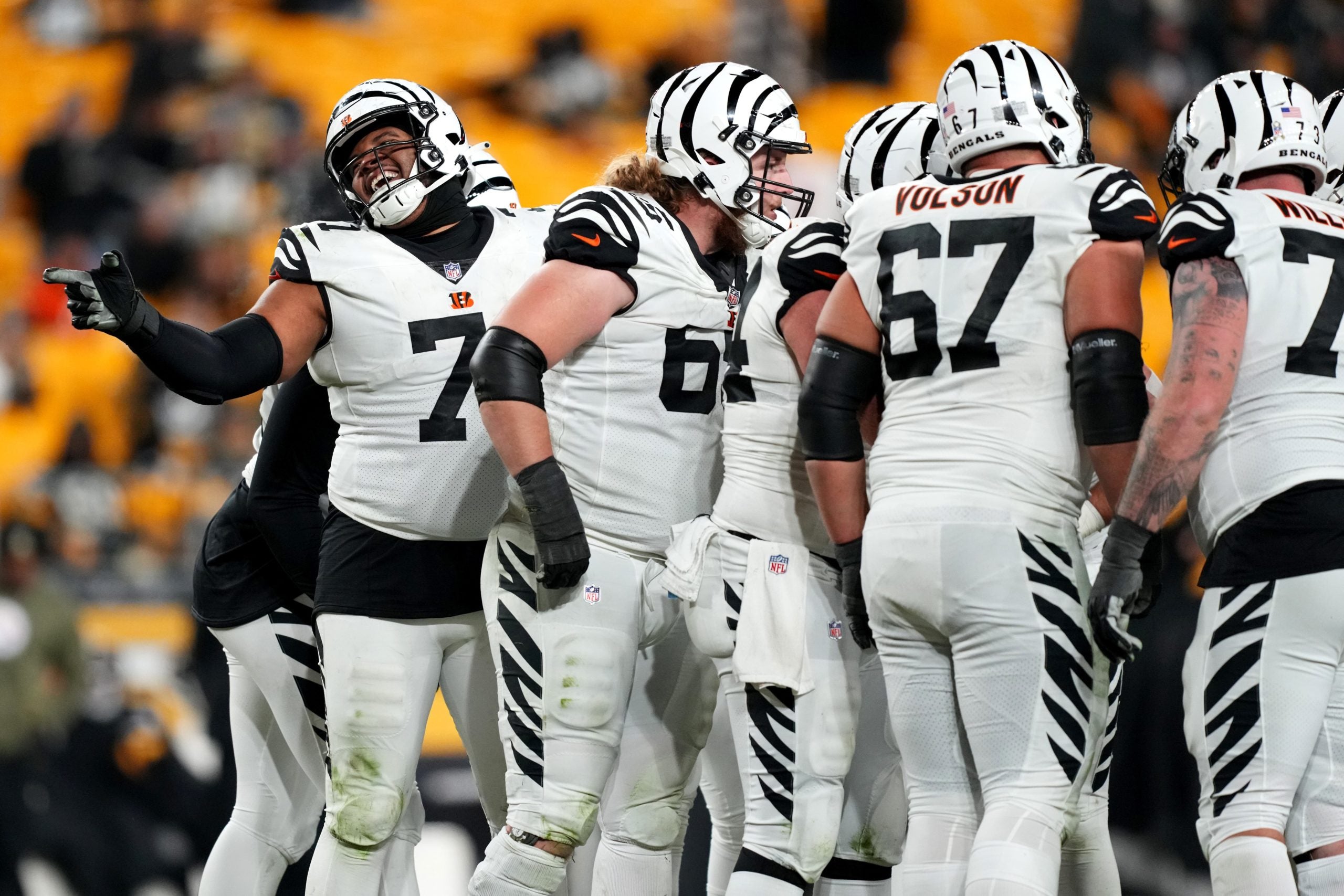 Cincinnati Bengals offensive tackle La'el Collins (71) jokes with the Pittsburgh Steelers defensive line in the fourth quarter during a Week 11 NFL game, Sunday, Nov. 20, 2022, at Acrisure Stadium in Pittsburgh, Pa. The Cincinnati Bengals won, 37-30. Nfl Cincinnati Bengals At Pittsburgh Steelers Nov 20 0158