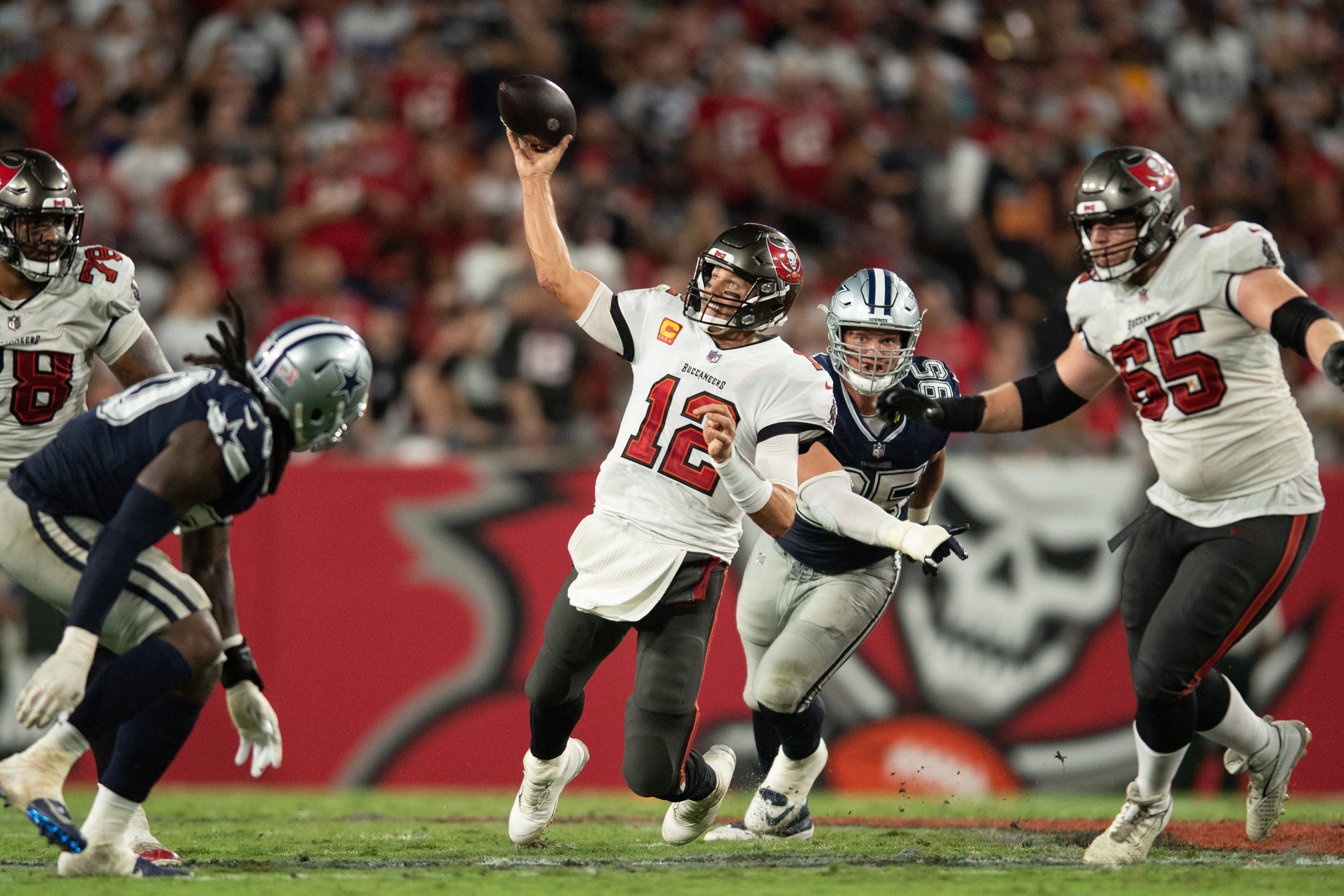 Sep 9, 2021; Tampa, Florida, USA;  Tampa Bay Buccaneers quarterback Tom Brady (12) throws the ball against the Dallas Cowboys in the fourth quarter at Raymond James Stadium. Mandatory Credit: Jeremy Reper-USA TODAY Sports