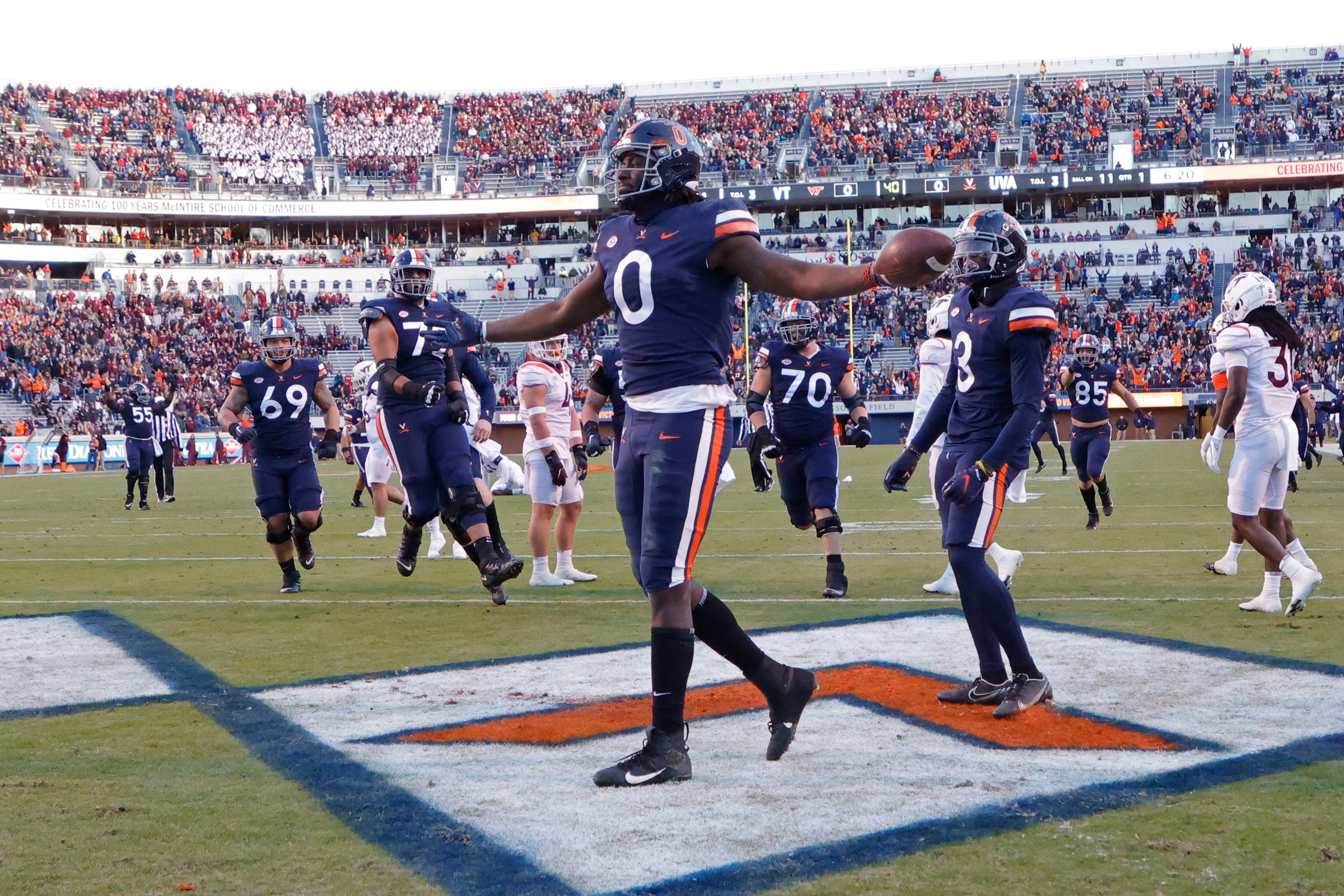 Nov 27, 2021; Charlottesville, Virginia, USA; Virginia Cavaliers tight end Jelani Woods (0) celebrates after scoring a touchdown against the Virginia Tech Hokies during the first quarter at Scott Stadium. Mandatory Credit: Geoff Burke-USA TODAY Sports