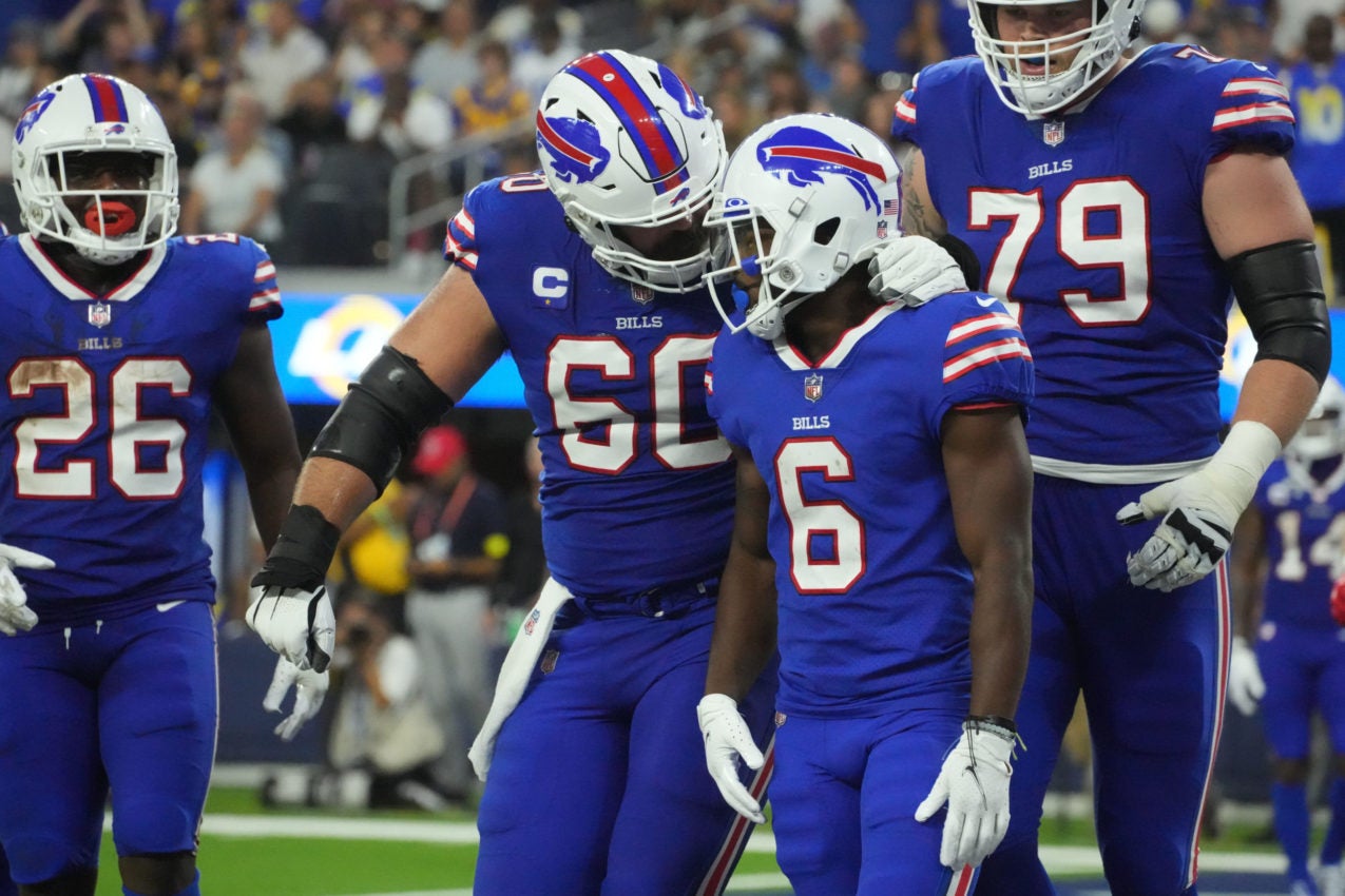 Sep 8, 2022; Inglewood, California, USA; Buffalo Bills wide receiver Isaiah McKenzie (6) celebrates a touchdown with center Mitch Morse (60) in the second half against the Los Angeles Rams at SoFi Stadium. Mandatory Credit: Kirby Lee-USA TODAY Sports