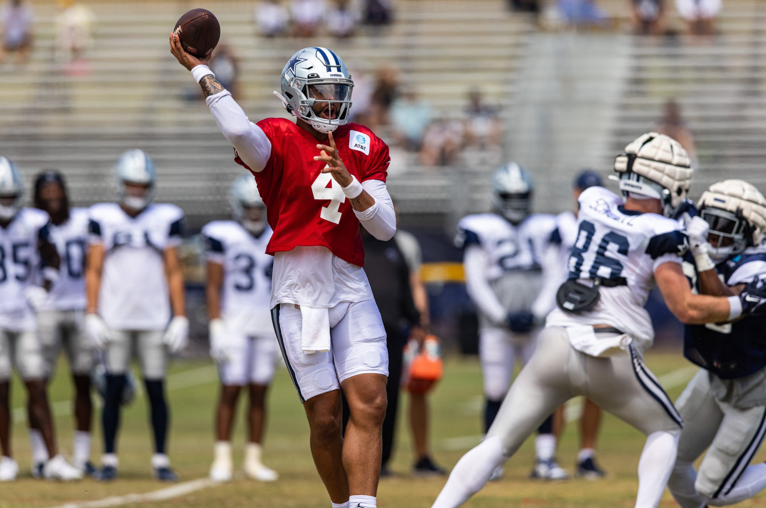 Aug 4, 2022; Oxnard, CA, USA; Dallas Cowboys quarterback Dak Prescott (4) throws during training camp at River Ridge Playing Fields in Oxnard, California. Mandatory Credit: Jason Parkhurst-USA TODAY Sports