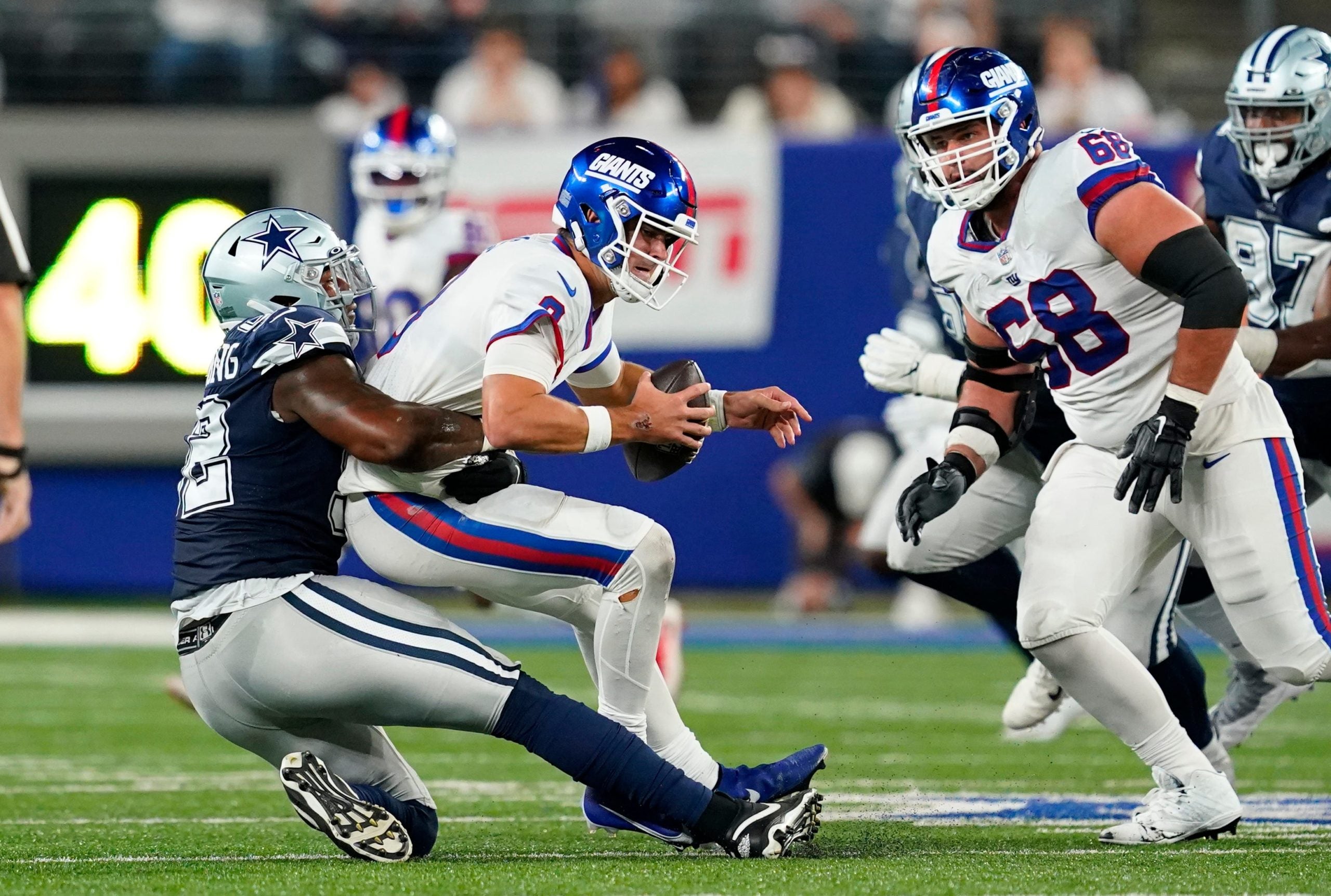 Dallas Cowboys defensive end Dorance Armstrong (92) sacks New York Giants quarterback Daniel Jones (8) in the second half. The Giants fall to the Cowboys, 23-16, at MetLife Stadium on Monday, Sept. 26, 2022. Nfl Ny Giants Vs Dallas Cowboys Cowboys At Giants