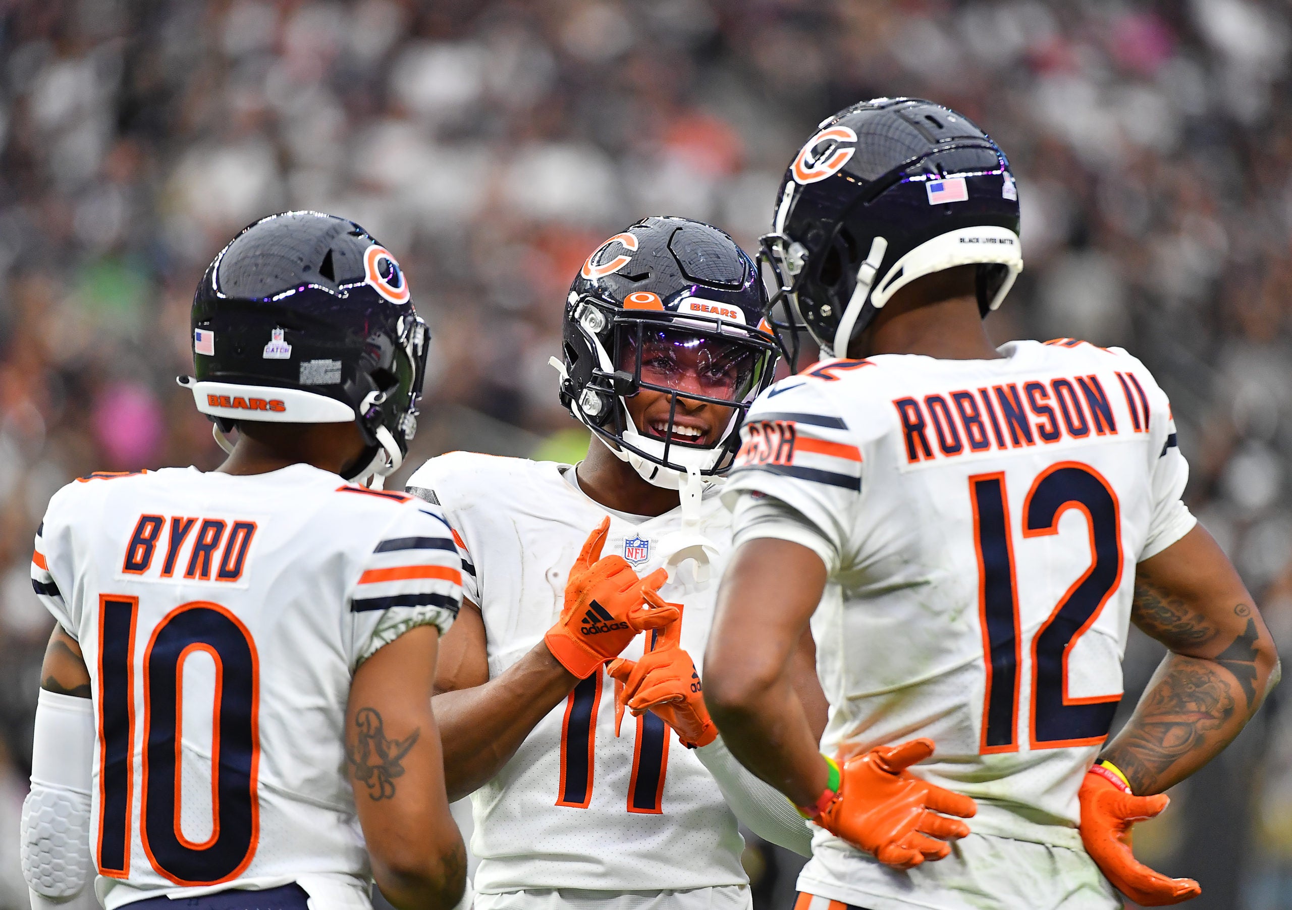 Oct 10, 2021; Paradise, Nevada, USA; Chicago Bears wide receiver Darnell Mooney (11) talks with Chicago Bears wide receiver Allen Robinson (12) and Chicago Bears wide receiver Damiere Byrd (10) during a game against the Las Vegas Raiders at Allegiant Stadium. Mandatory Credit: Stephen R. Sylvanie-USA TODAY Sports