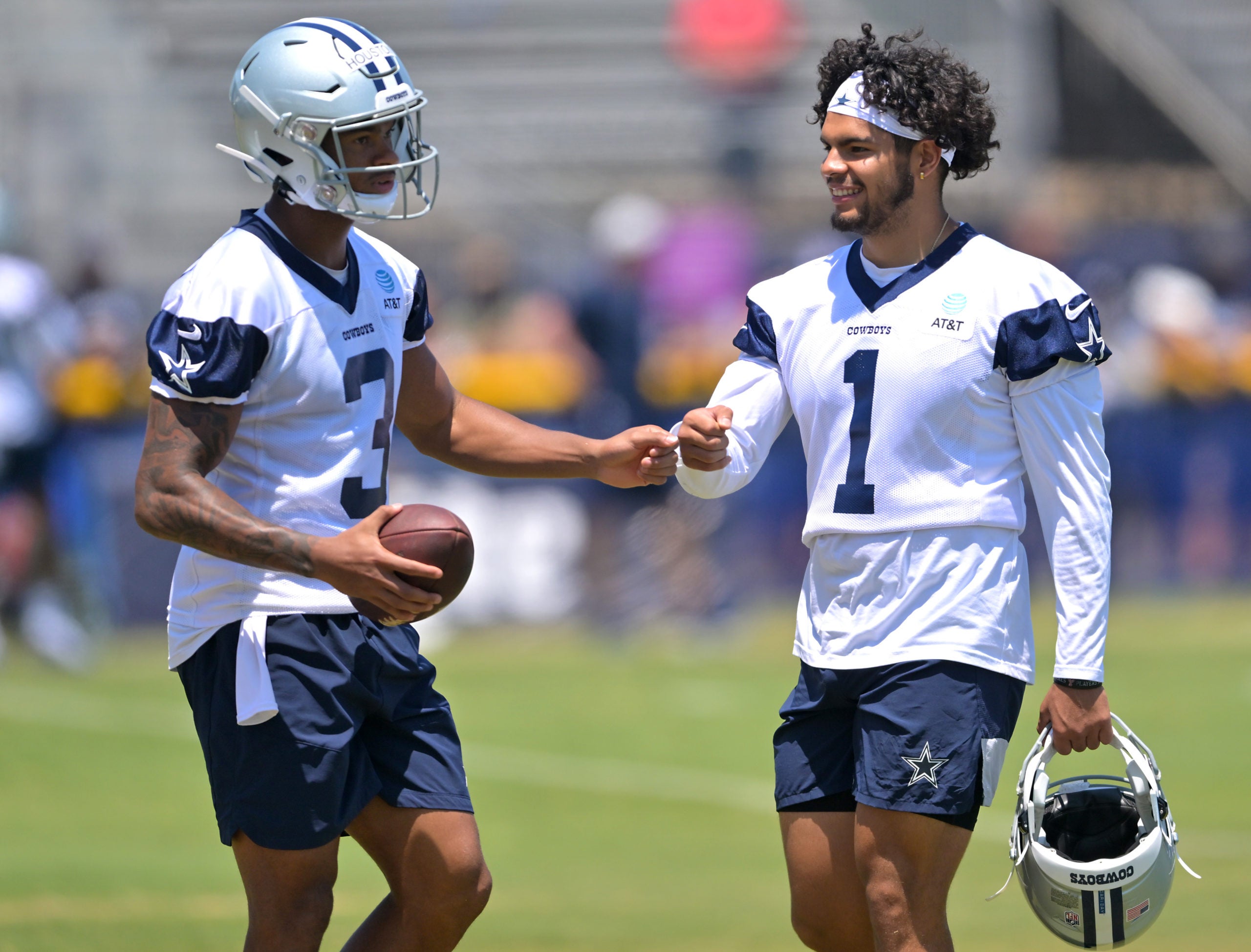 Jul 29, 2022; Onxard, CA, USA;   Dallas Cowboys wide receiver Dennis Houston (3) and kicker Jonathan Garibay (1) fist bump as they leave the field following the day of training camp at River Ridge Fields in Oxnard, CA. Mandatory Credit: Jayne Kamin-Oncea-USA TODAY Sports