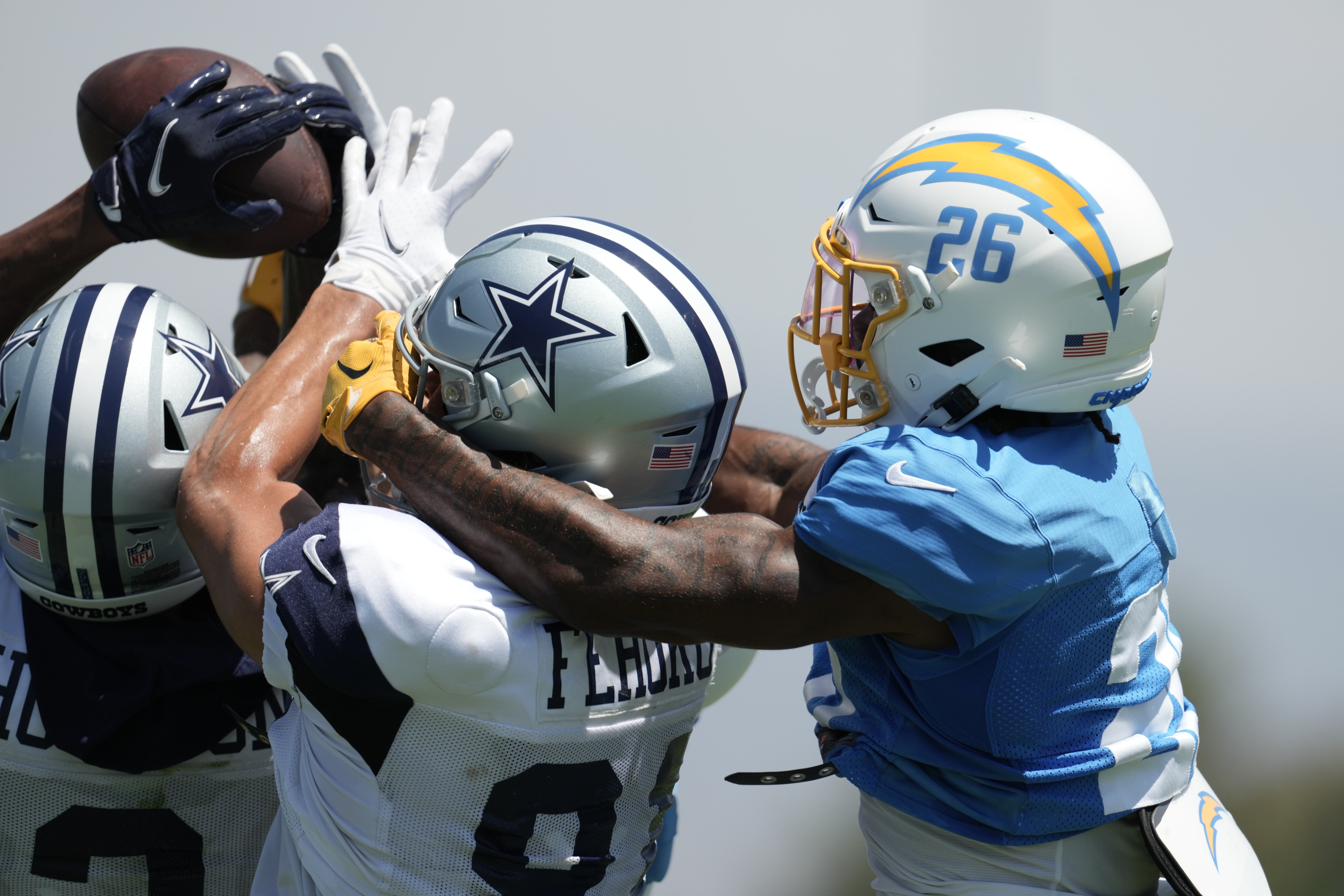 Aug 18, 2022; Costa Mesa, CA, USA; Dallas Cowboys receiver Dennis Houston (3) catches a pass in front of Cowboys wide receiver Simi Fehoko (81) and Los Angeles Chargers cornerback Asante Samuel Jr. (26) during joint practice at Jack Hammett Sports Complex. Mandatory Credit: Kirby Lee-USA TODAY Sports