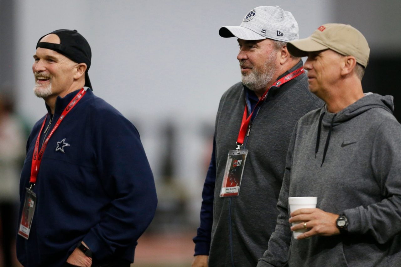 Dallas Cowboys defensive coordinator Dan Quinn and head coach Michael McCarthy watch during Georgia's Pro Day in Athens, Ga., on Wednesday, March 16, 2022. Mandatory credit: Joshua L. Jones / USA TODAY NETWORK