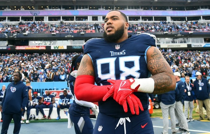 Tennessee Titans Jeffery Simmons injury Jacksonville Jaguars ankle 2022 sacks contract nfl football stats news