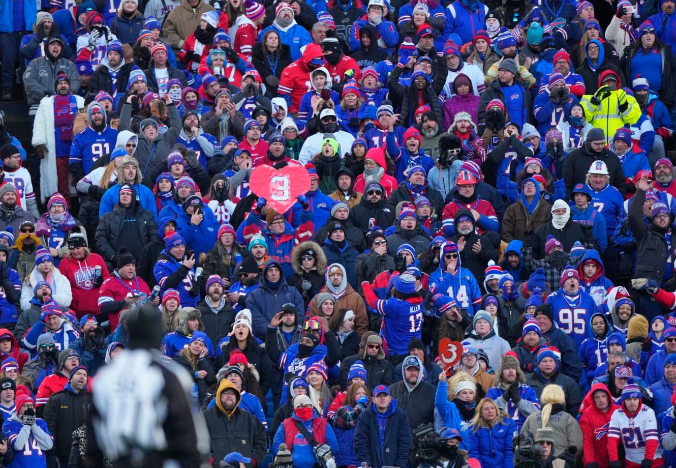 Jan 15, 2023; Orchard Park, NY, USA; Buffalo Bills fans cheer against the Miami Dolphins during the second half in a NFL wild card game at Highmark Stadium. Mandatory Credit: Gregory Fisher-USA TODAY Sports