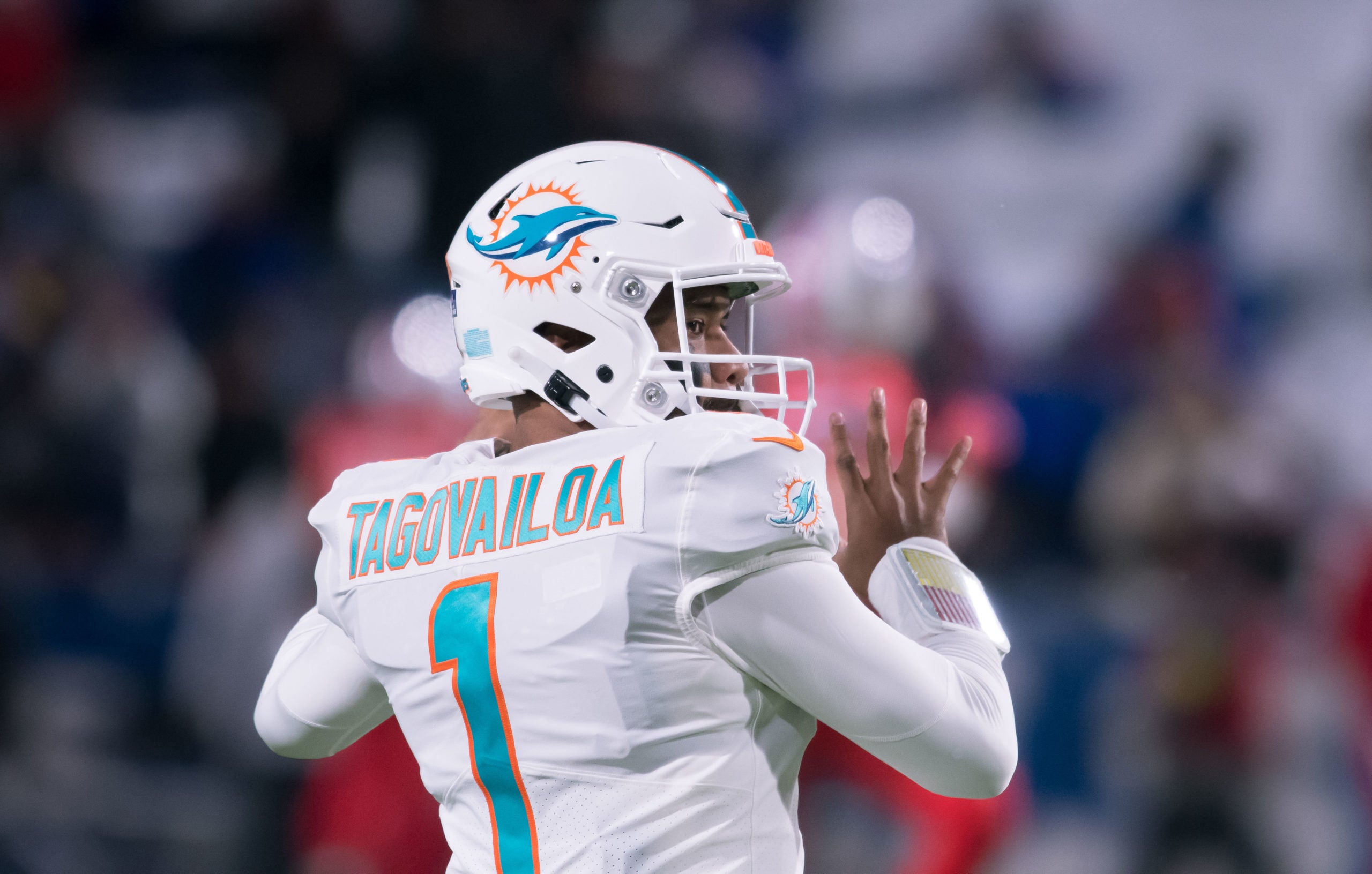 Dec 17, 2022; Orchard Park, New York, USA; Miami Dolphins quarterback Tua Tagovailoa (1) warms up before a game against the Buffalo Bills at Highmark Stadium. Mandatory Credit: Mark Konezny-USA TODAY Sports