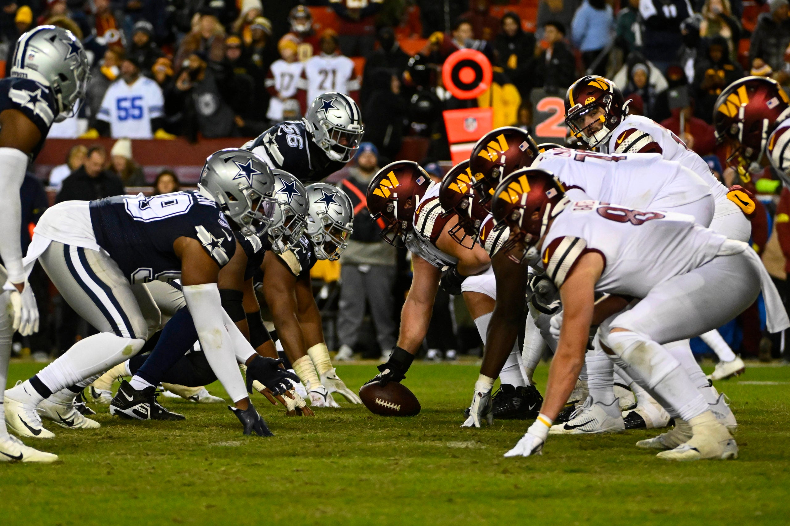 Jan 8, 2023; Landover, Maryland, USA; Washington Commanders and Dallas Cowboys at the line of scrimmage during the second half at FedExField. Mandatory Credit: Brad Mills-USA TODAY Sports