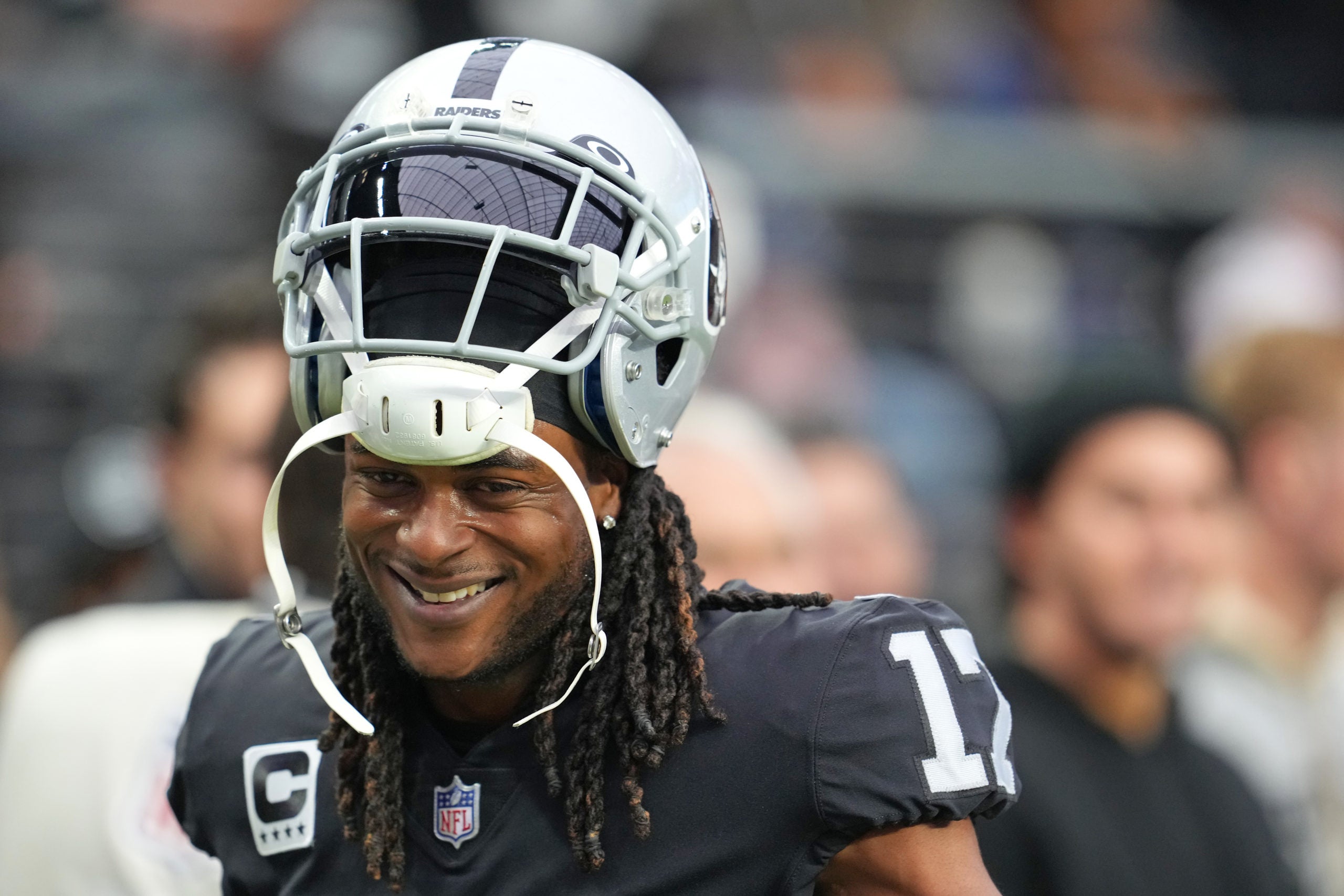 Las Vegas Raiders wide receiver Davante Adams smiling.