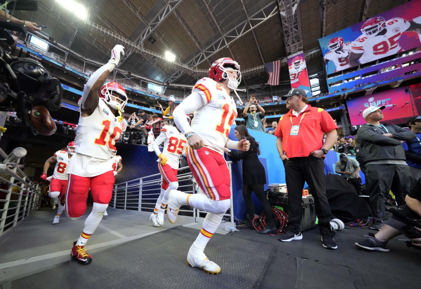 Kansas City Chiefs quarterback Patrick Mahomes (15) and running back Isiah Pacheco (10) run to the field before playing the Philadelphia Eagles in Super Bowl LVII at State Farm Stadium in Glendale on Feb. 12, 2023. Nfl Super Bowl Lvii Kansas City Chiefs Vs Philadelphia Eagles