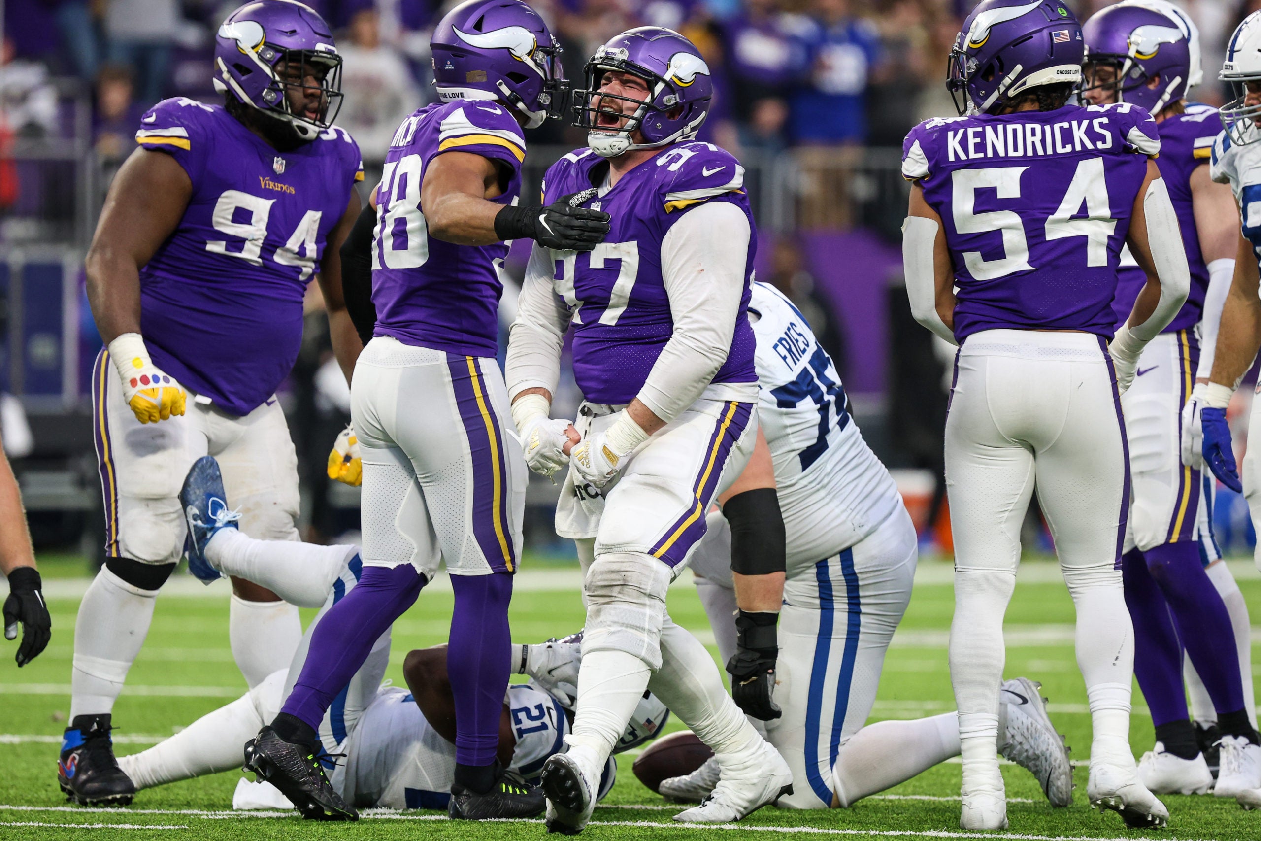 Dec 17, 2022; Minneapolis, Minnesota, USA; Minnesota Vikings defensive tackle Harrison Phillips (97) reacts after making a tackle against the Indianapolis Colts during the fourth quarter at U.S. Bank Stadium. Mandatory Credit: Matt Krohn-USA TODAY Sports