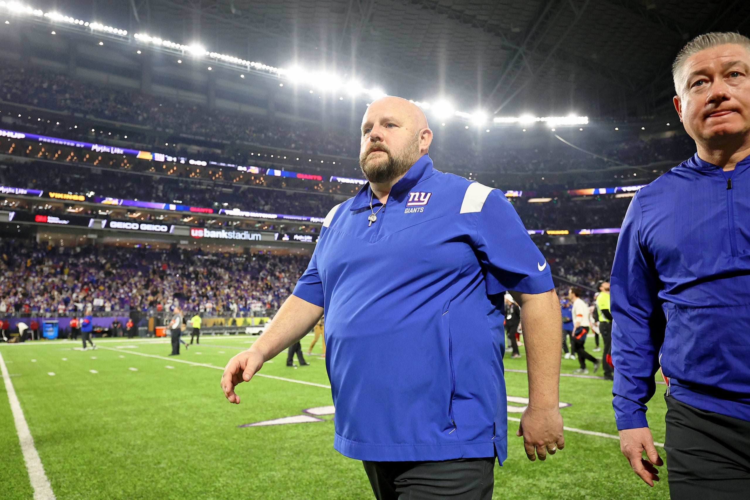 Jan 15, 2023; Minneapolis, Minnesota, USA; New York Giants head coach Brian Daboll walks off the field after winning a wild card game against the Minnesota Vikings at U.S. Bank Stadium. Mandatory Credit: Matt Krohn-USA TODAY Sports