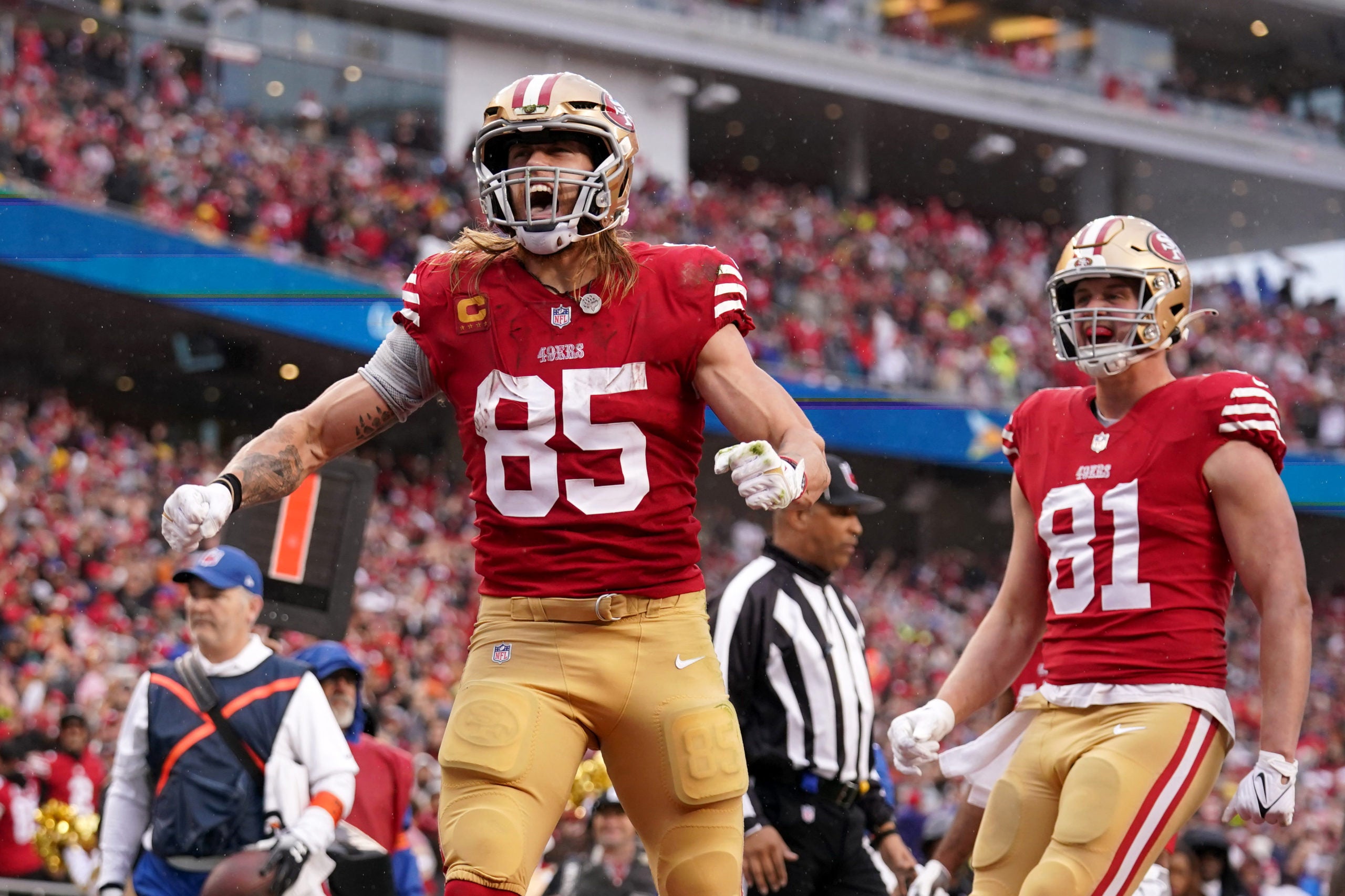 Jan 14, 2023; Santa Clara, California, USA; San Francisco 49ers tight end George Kittle (85) reacts after catching a pass for a two-point conversion in the third quarter of a wild card game against the Seattle Seahawks at Levi's Stadium. Mandatory Credit: Cary Edmondson-USA TODAY Sports