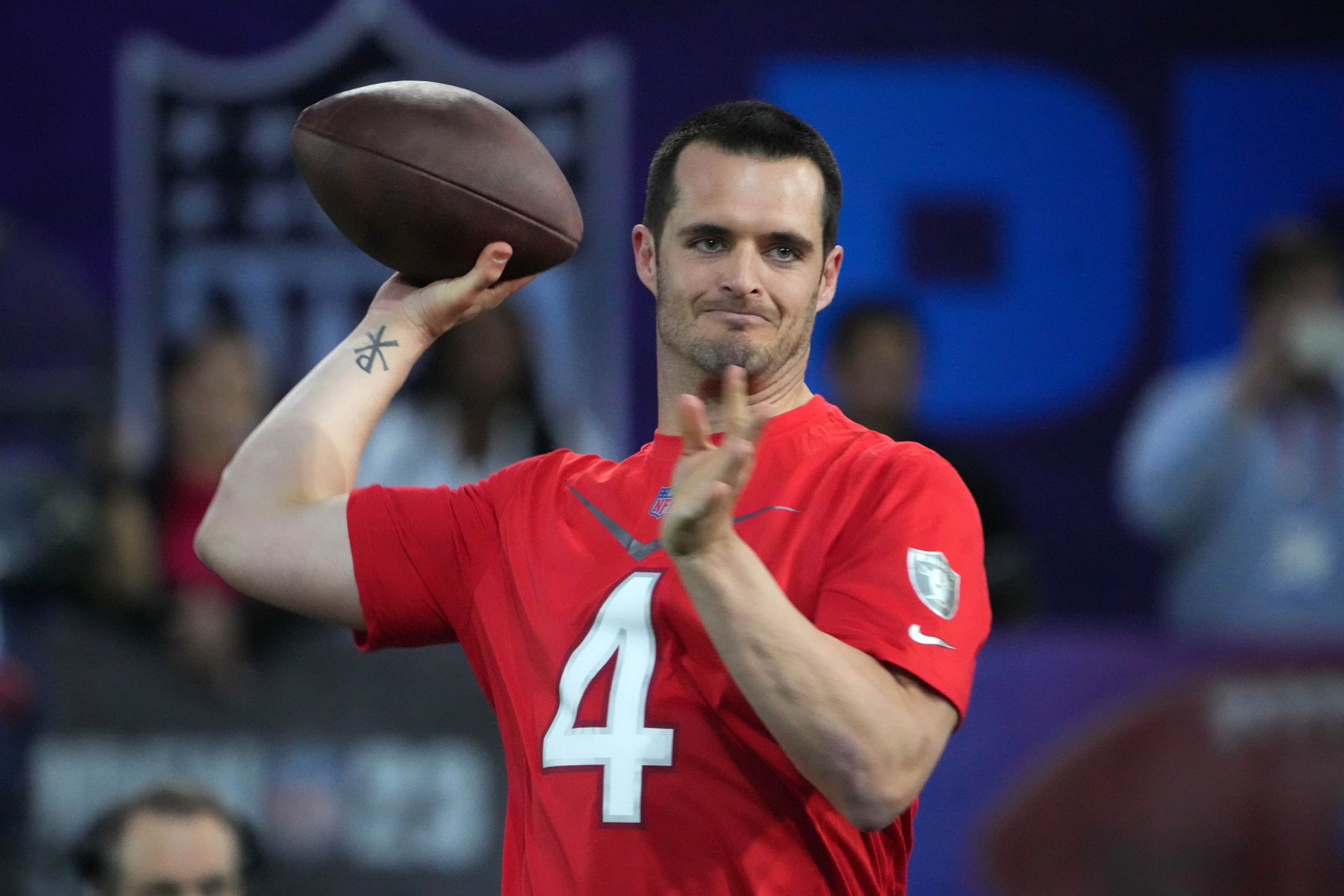 Feb 2, 2023; Henderson, NV, USA; Las Vegas Raiders quarterback Derek Carr (4) throws during the Pro Bowl Skills competition at the Intermountain Healthcare Performance Facility. Mandatory Credit: Kirby Lee-USA TODAY Sports