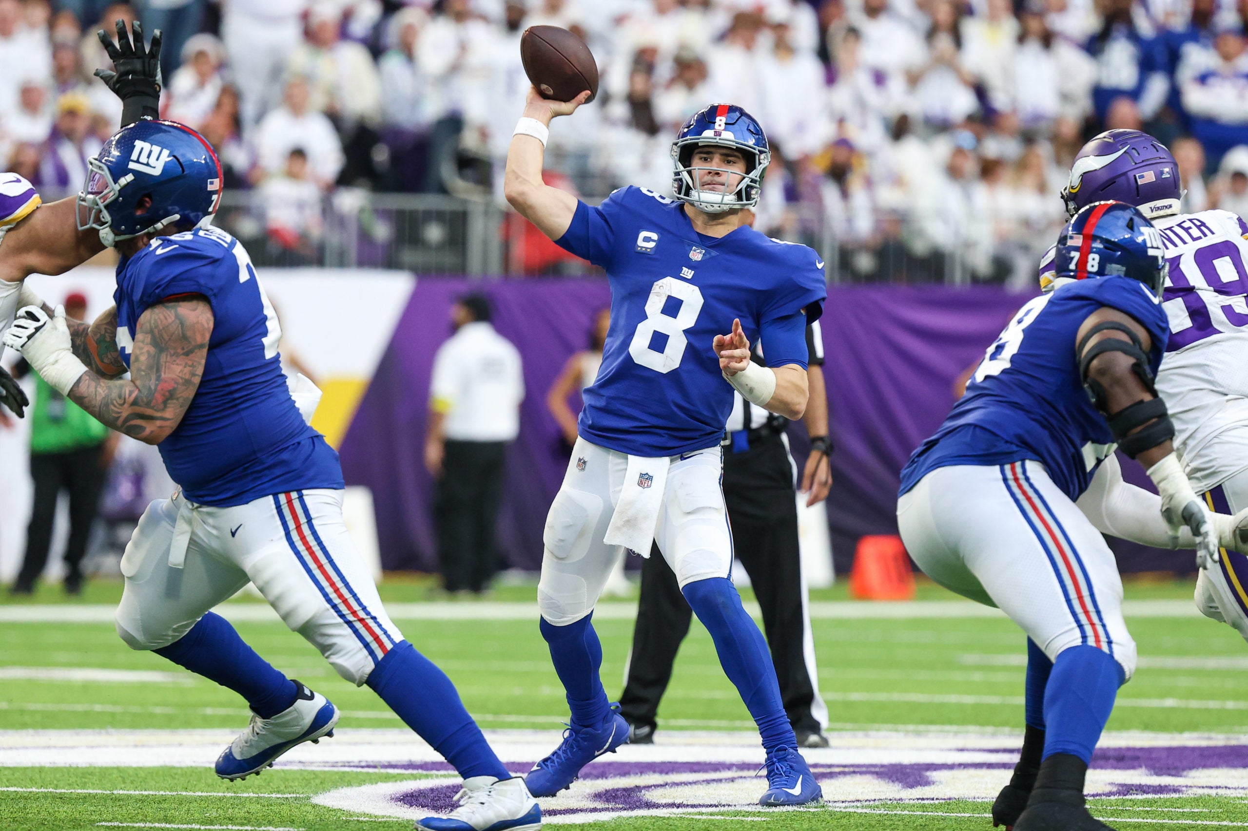 Dec 24, 2022; Minneapolis, Minnesota, USA; New York Giants quarterback Daniel Jones (8) throws the ball against the Minnesota Vikings during the fourth quarter at U.S. Bank Stadium. Mandatory Credit: Matt Krohn-USA TODAY Sports