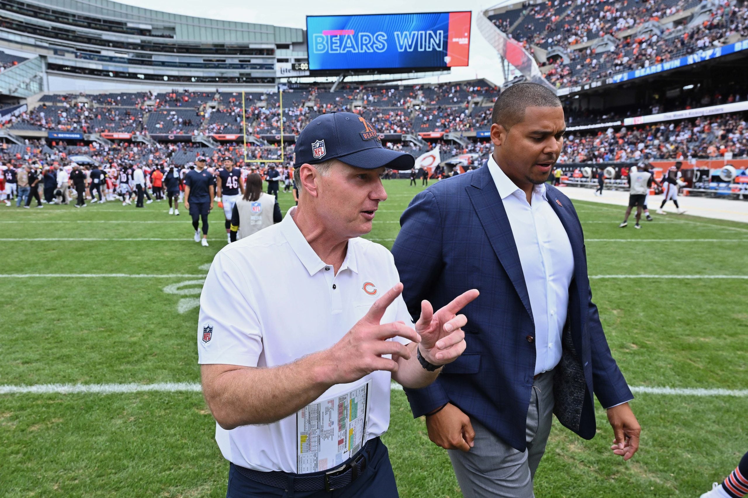 Aug 13, 2022; Chicago, Illinois, USA;  Chicago Bears head coach Matt Eberflus, left, and general manager Ryan Poles walk off the field after the Bears defeated the Kansas City Chiefs 19-14 at Soldier Field. Mandatory Credit: Jamie Sabau-USA TODAY Sports