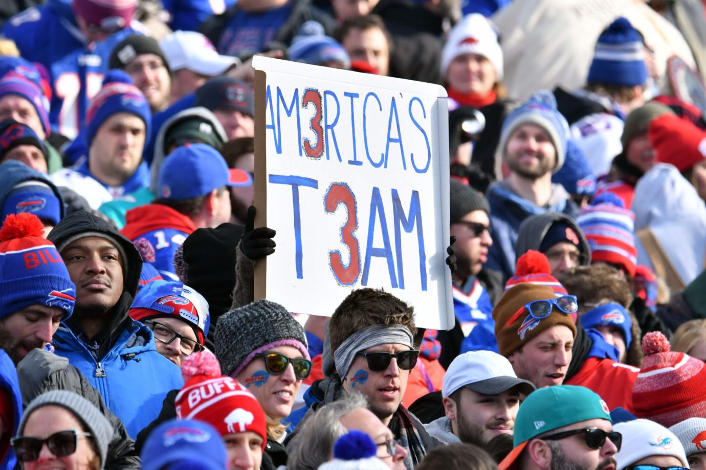 Jan 15, 2023; Orchard Park, NY, USA; Fans of the Buffalo Bills hold a sign supporting Damar Hamlin (not pictured) during the first half in a NFL wild card game against the Miami Dolphins at Highmark Stadium. Mandatory Credit: Mark Konezny-USA TODAY Sports