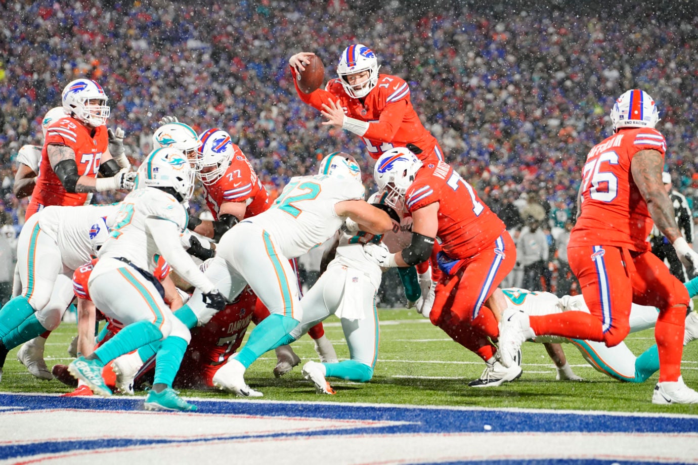 Dec 17, 2022; Orchard Park, New York, USA; Buffalo Bills quarterback Josh Allen (17) dives for a two point conversion against the Miami Dolphins during the second half at Highmark Stadium. Mandatory Credit: Gregory Fisher-USA TODAY Sports