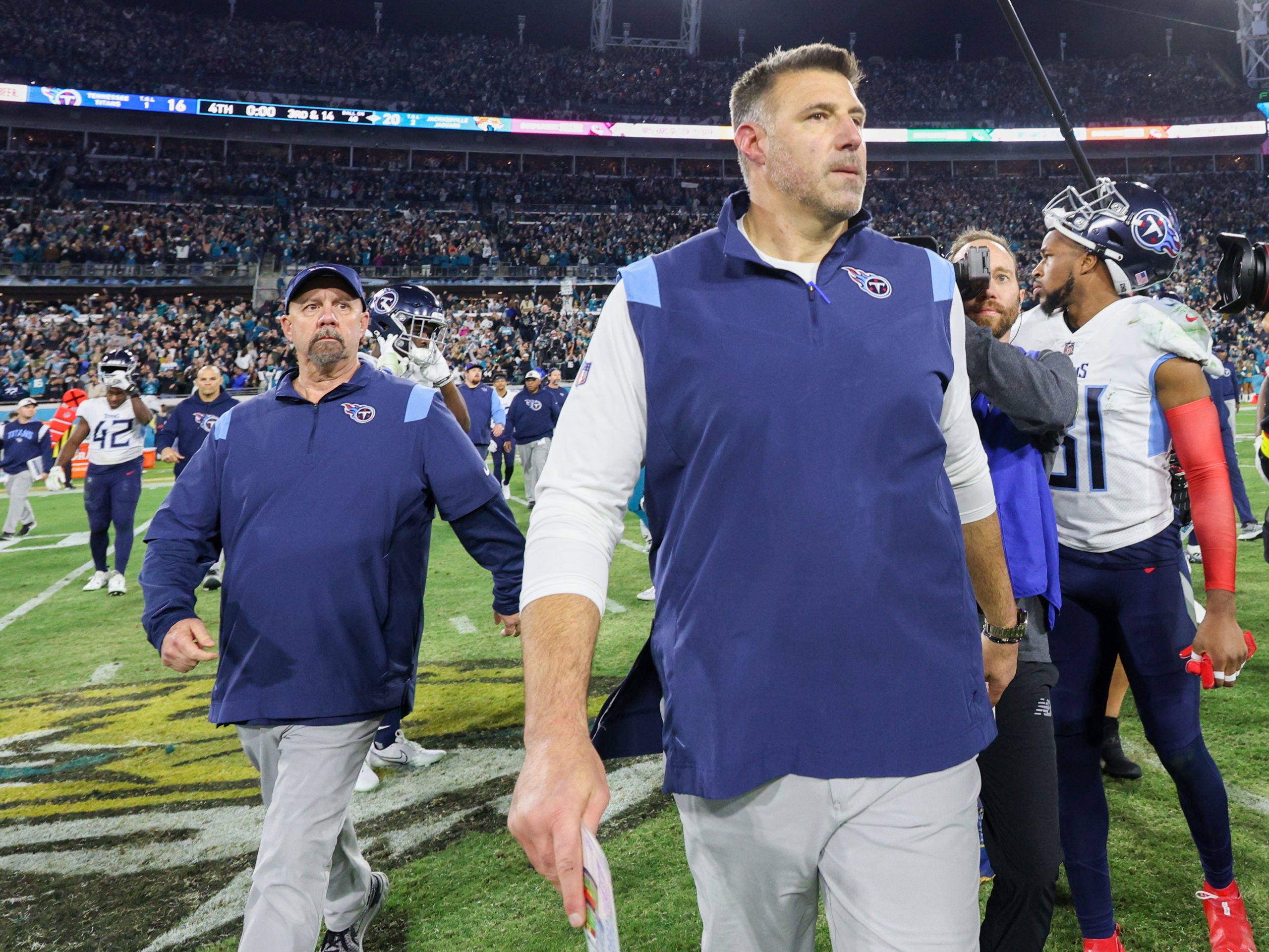 Jan 7, 2023; Jacksonville, Florida, USA;  Tennessee Titans head coach Mike Vrabel leaves the field after losing to the Jacksonville Jaguars at TIAA Bank Field. Mandatory Credit: Nathan Ray Seebeck-USA TODAY Sports