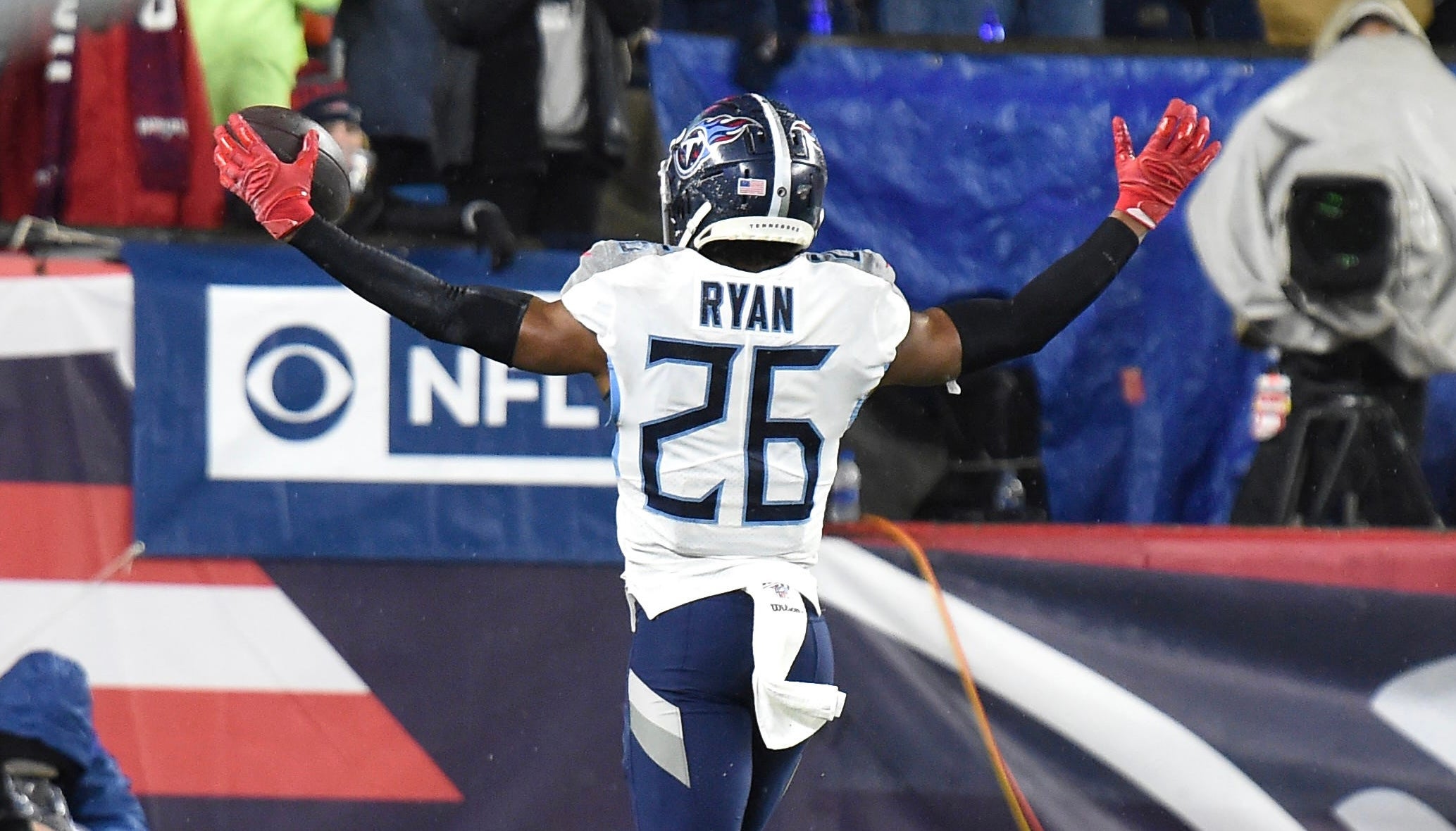 Tennessee Titans cornerback Logan Ryan (26) celebrates his touchdown late in the fourth quarter of a New England Patriots quarterback Tom Brady (12) pass that sealed the win in an AFC Wild Card game at Gillette Stadium Saturday, Jan. 4, 2020 in Foxborough, Mass. Gw41077