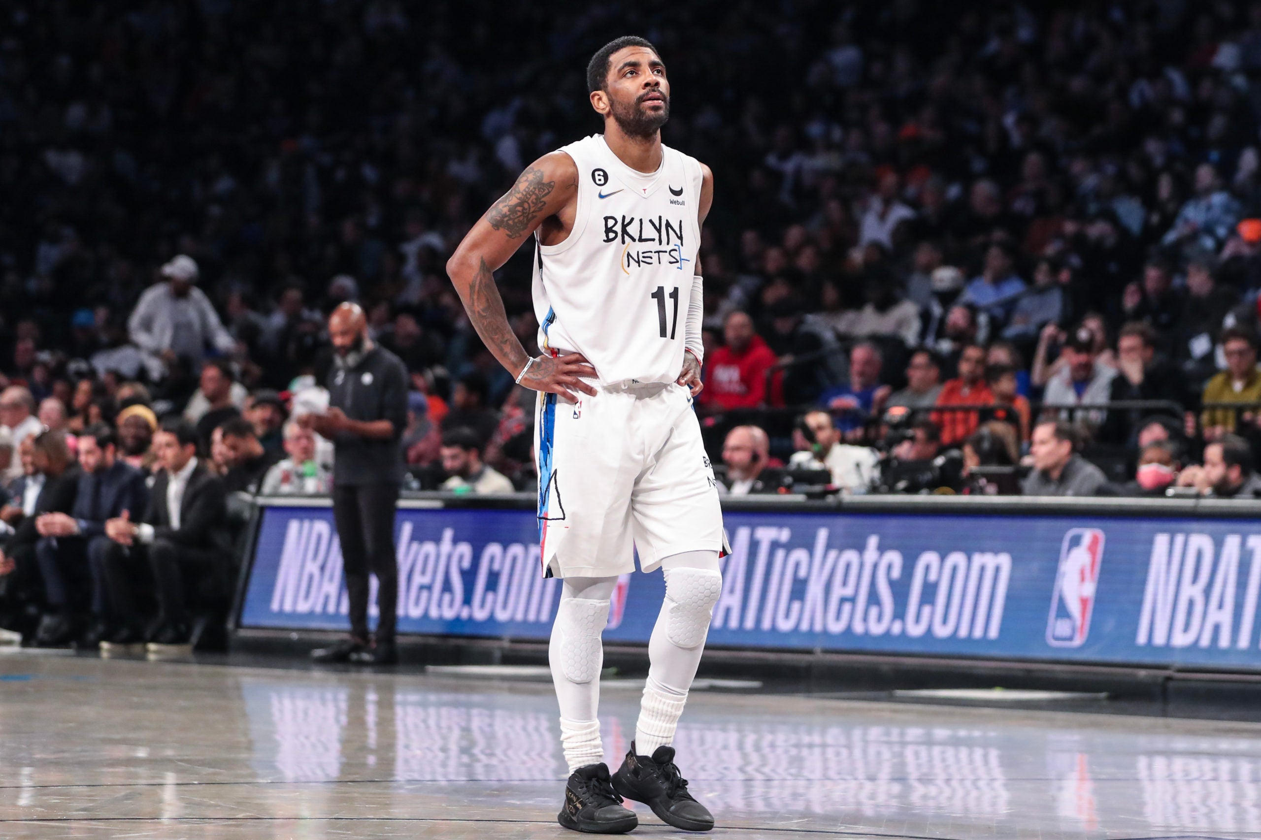 an 28, 2023; Brooklyn, New York, USA; Brooklyn Nets guard Kyrie Irving (11) looks up at the scoreboard in the second quarter against the New York Knicks at Barclays Center.