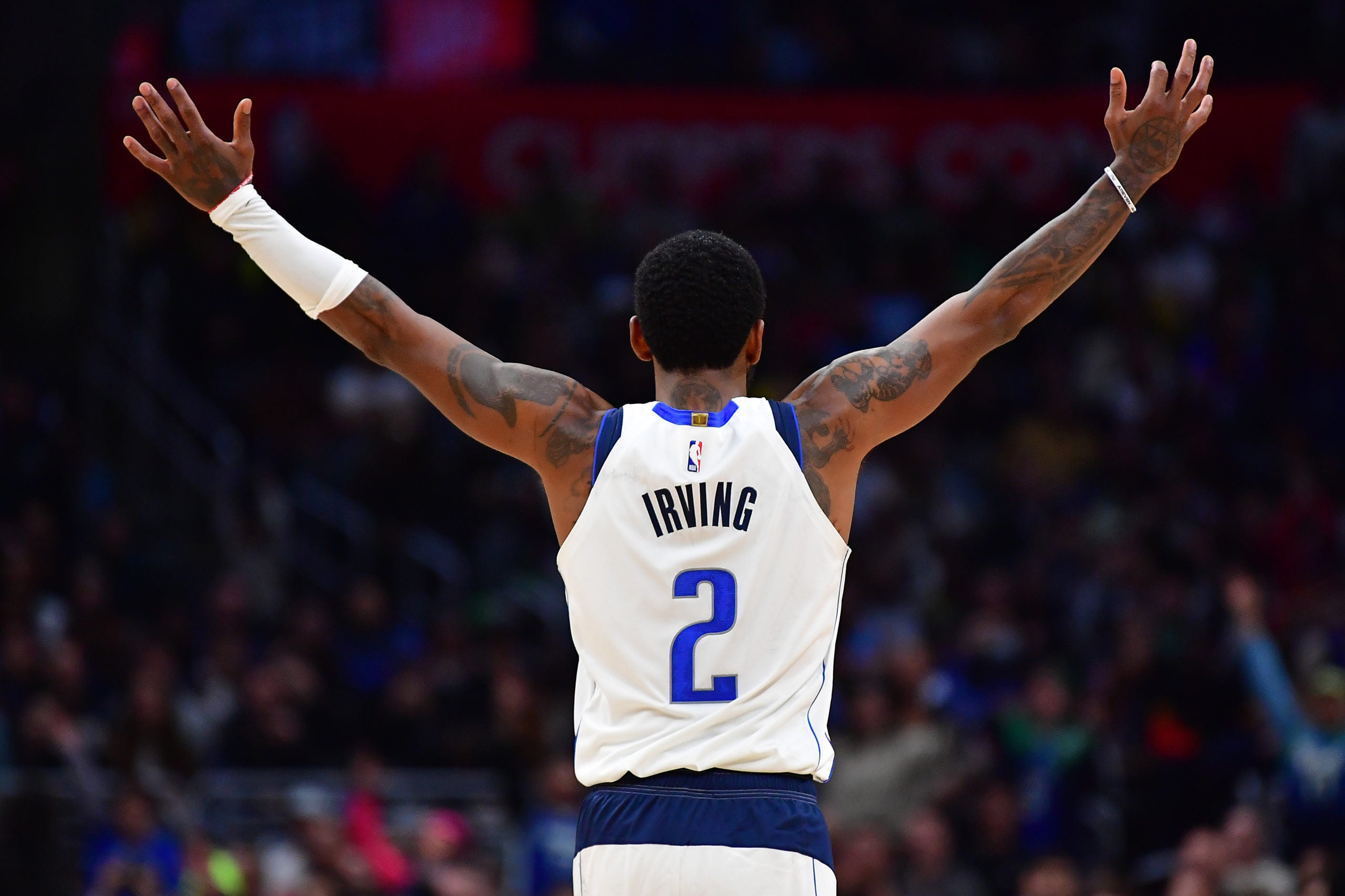 allas Mavericks guard Kyrie Irving (2) reacts against the Los Angeles Clippers during the second half at Crypto.com Arena.