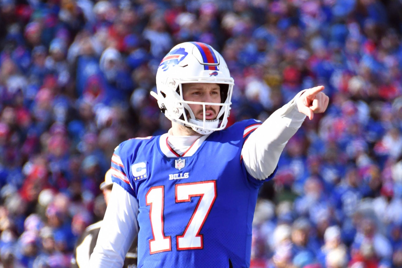 Jan 15, 2023; Orchard Park, NY, USA; Buffalo Bills quarterback Josh Allen (17) before a snap against the Miami Dolphins during the first half in a NFL wild card game at Highmark Stadium. Mandatory Credit: Mark Konezny-USA TODAY Sports