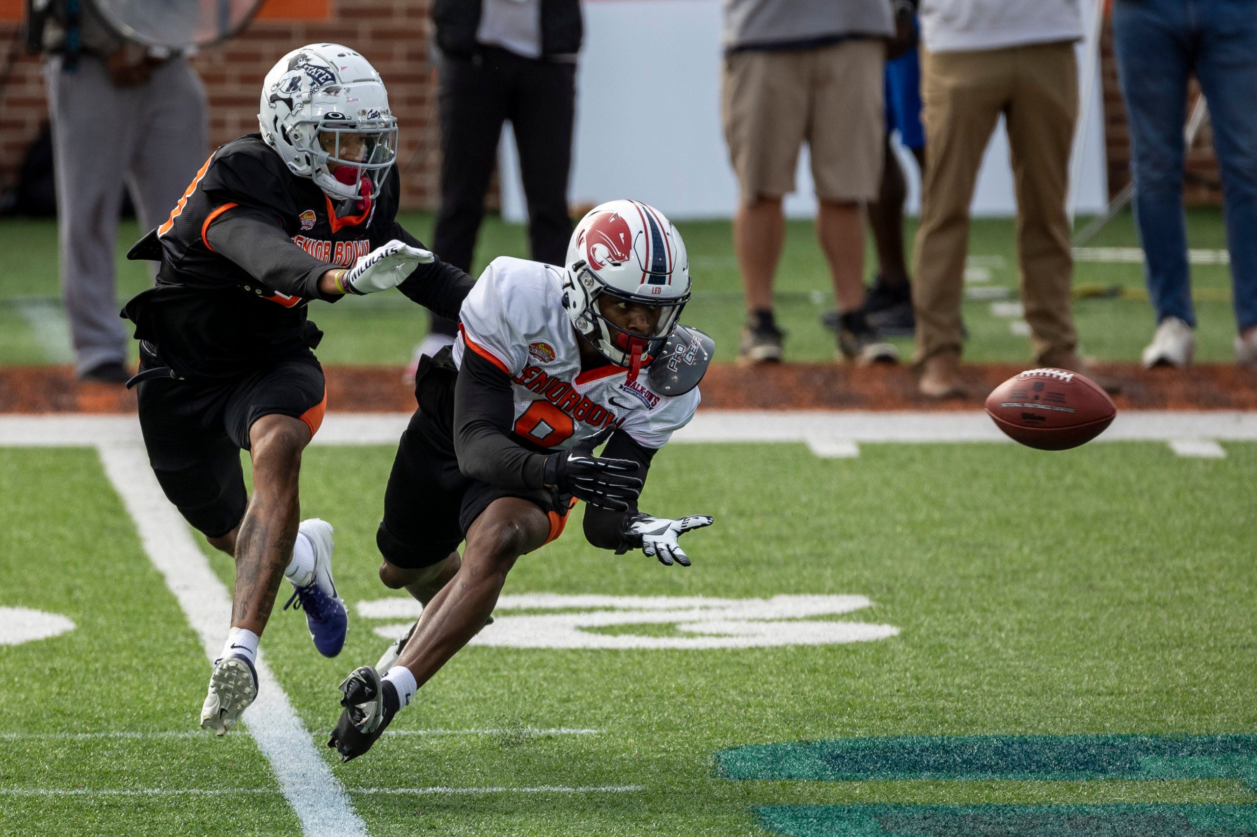 Feb 1, 2023; Mobile, AL, USA; American defensive back Julius Brents of Kansas State (23) defends as American wide receiver Jalen Wayne of South Alabama (8) dives for a pass during the second day of Senior Bowl week at Hancock Whitney Stadium in Mobile. Mandatory Credit: Vasha Hunt-USA TODAY Sports