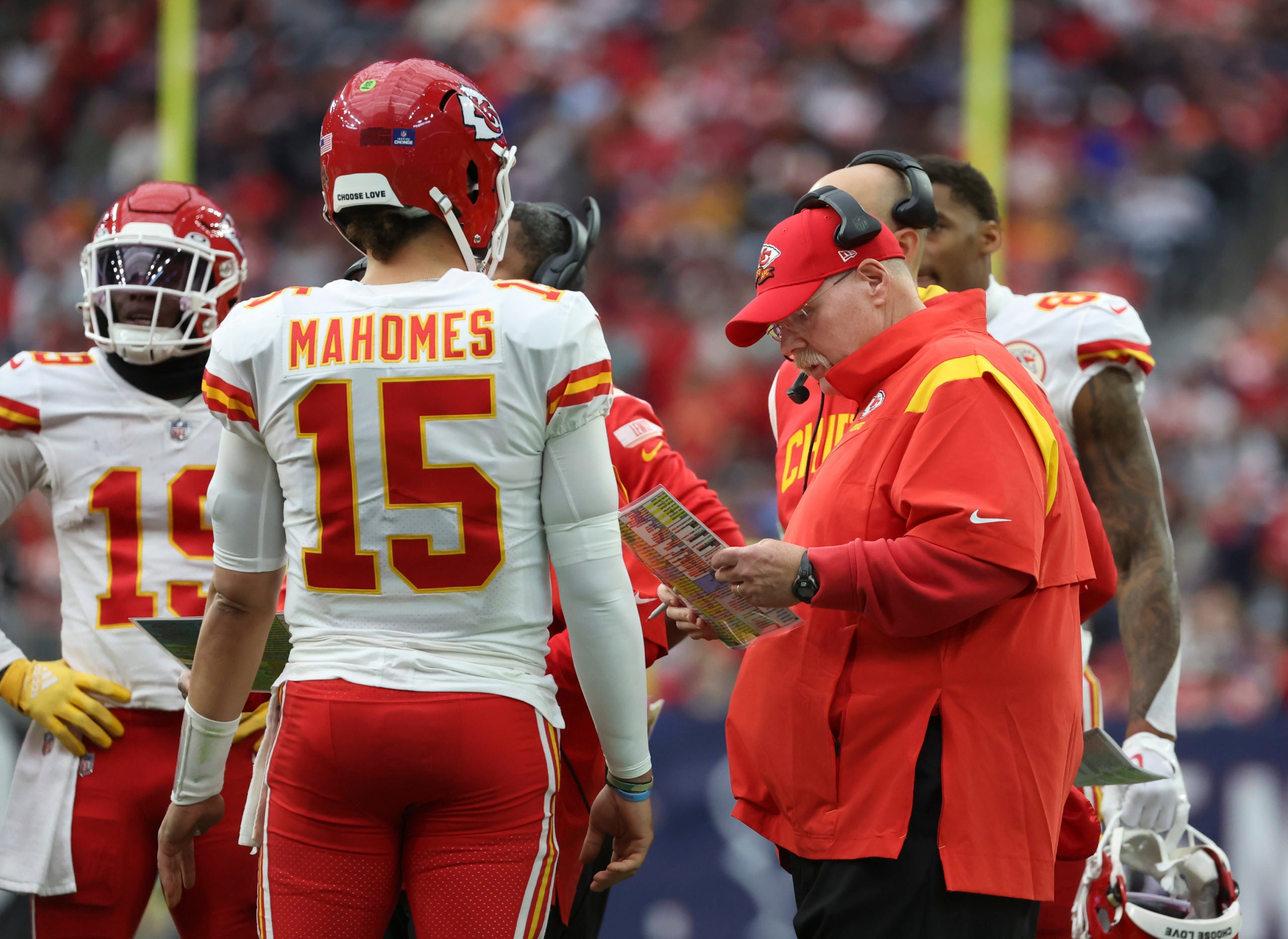 Dec 18, 2022; Houston, Texas, USA;  Kansas City Chiefs head coach Andy Reid speaks with Kansas City Chiefs quarterback Patrick Mahomes (15) during the first half against the Houston Texans at NRG Stadium. Mandatory Credit: Kevin Jairaj-USA TODAY Sports